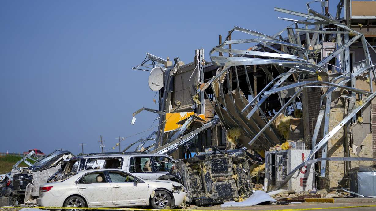 Damage is seen at a truck stop the morning after a tornado rolled through, Sunday in Valley View, Texas. Powerful storms left a wide trail of destruction Sunday across Texas, Oklahoma and Arkansas.