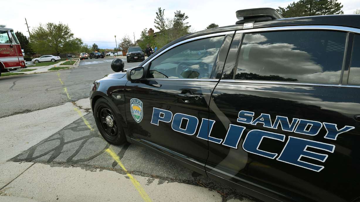 Sandy police believe a Sandy man sent his children out of the house just before killing their mother and then turning then gun on himself.