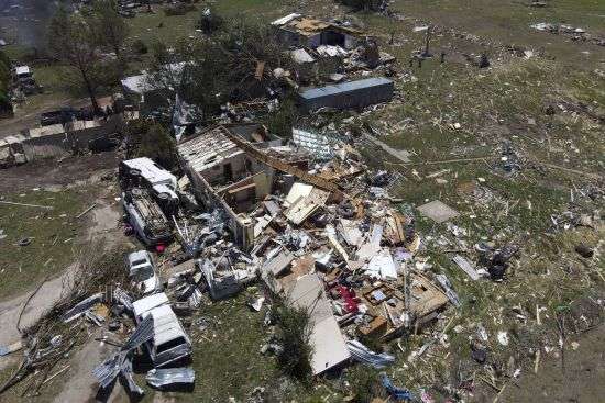 Destroyed homes are seen after a deadly tornado rolled through the previous night, Sunday, in Valley View, Texas.
