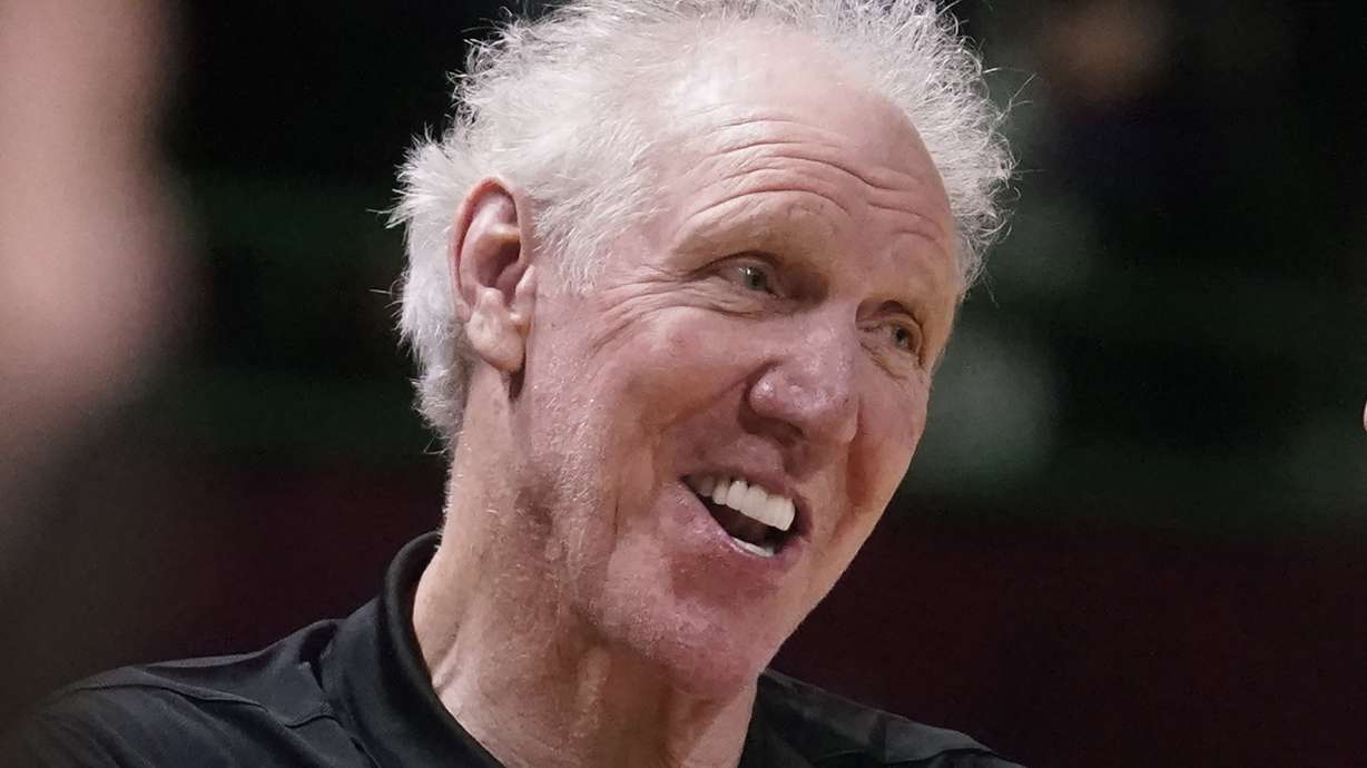 FILE - Basketball Hall of Fame legend Bill Walton laughs during a practice session for the NBA All-Star basketball game in Cleveland, Feb. 19, 2022. Walton, who starred for John Wooden's UCLA Bruins before becoming a Basketball Hall of Famer and one of the biggest stars of basketball broadcasting, died Monday, May 27, 2024, the league announced on behalf of his family. He was 71.