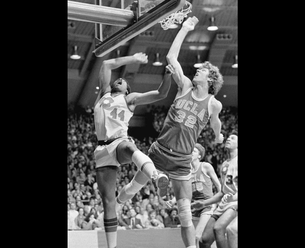 UCLA's Bill Walton, right, fights Notre Dame's Adrian Dantley for a rebound during an NCAA college basketball game in South Bend, Ind., Jan. 19, 1974.