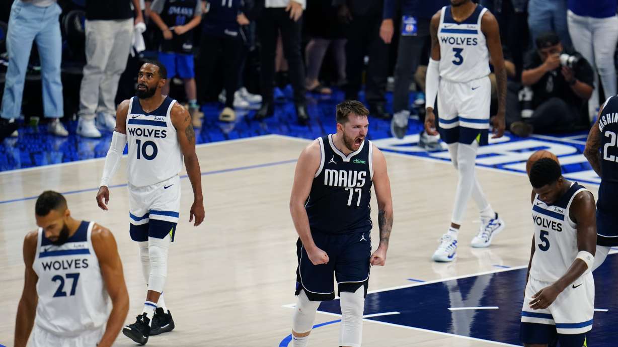 Dallas Mavericks guard Luka Doncic (77) celebrates a play against the Minnesota Timberwolves during the second half in Game 3 of the NBA basketball Western Conference finals, Sunday, May 26, 2024, in Dallas.
