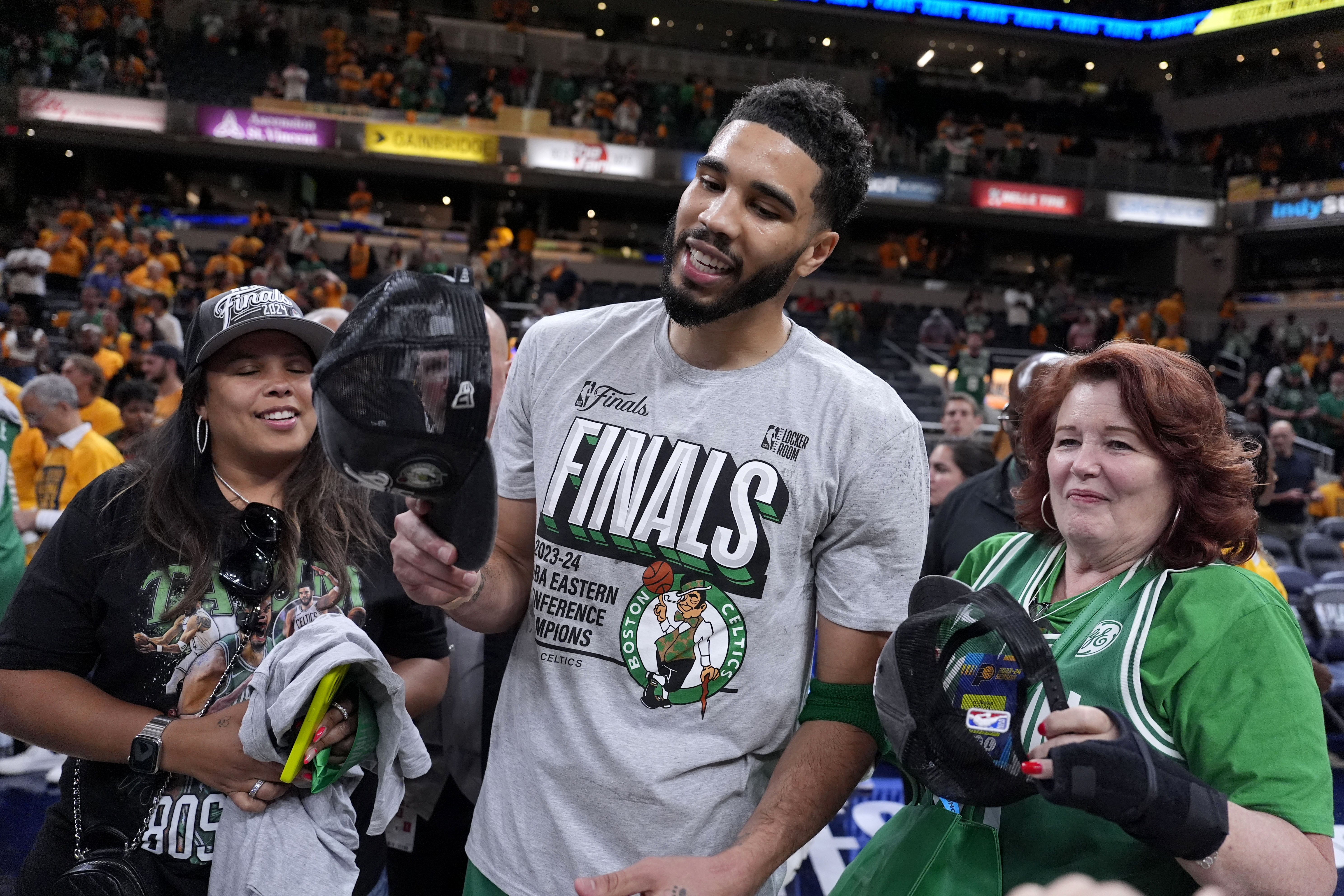Boston Celtics forward Jayson Tatum celebrates after Game 4 of the NBA Eastern Conference basketball finals against the Indiana Pacers, Monday, May 27, 2024, in Indianapolis. The Celtics won 105-102.