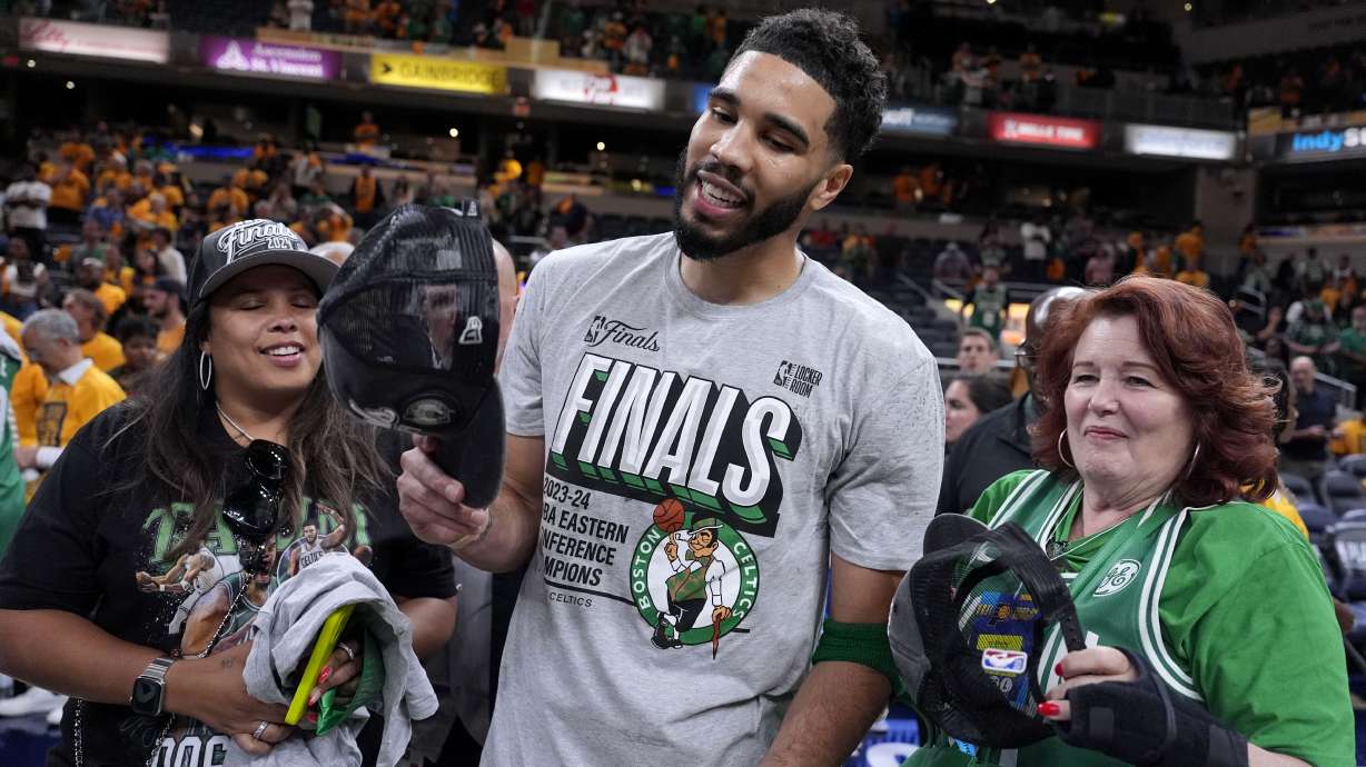 Boston Celtics forward Jayson Tatum celebrates after Game 4 of the NBA Eastern Conference basketball finals against the Indiana Pacers, Monday, May 27, 2024, in Indianapolis. The Celtics won 105-102.
