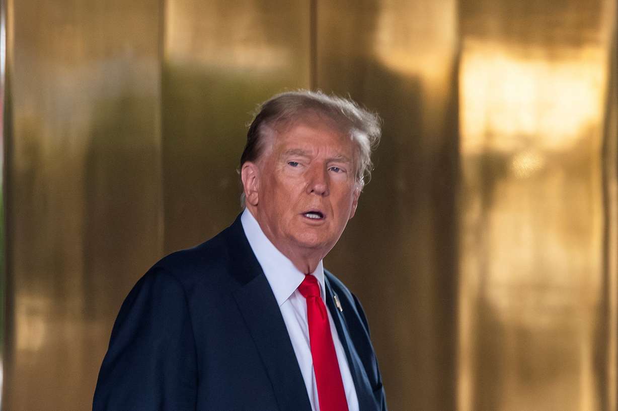 Former president Donald Trump exits Trump Tower to attend his hush money trial at Manhattan criminal court in New York City on Tuesday.