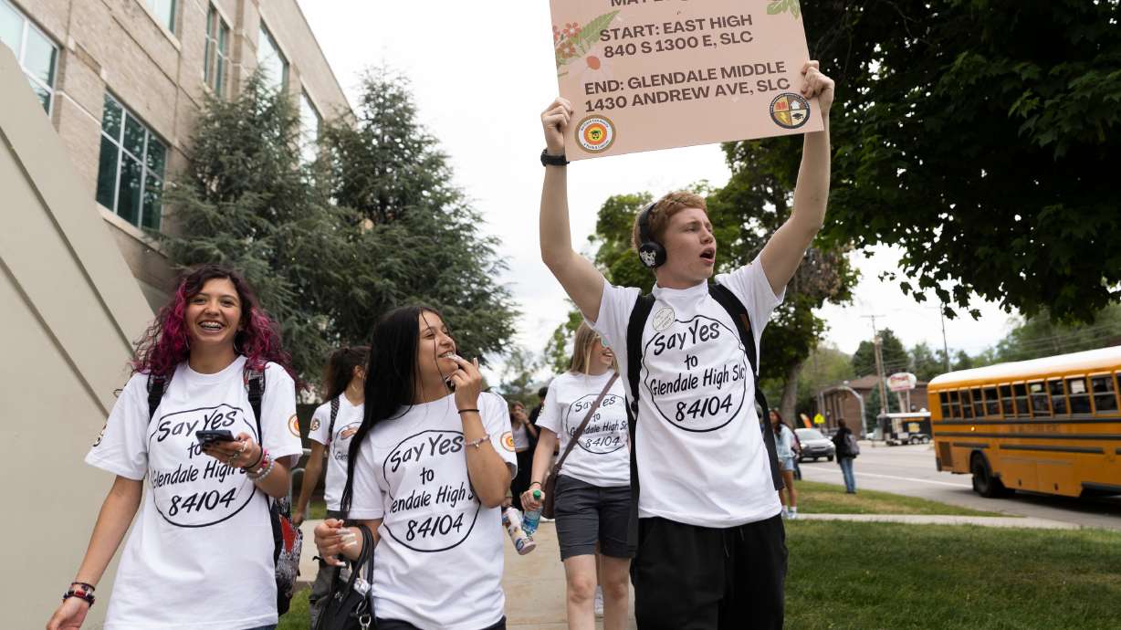 Students, parents and community members walked about 5 miles from East High School to Glendale Middle School to demonstrate support for a high school in Glendale in Salt Lake City on Tuesday.