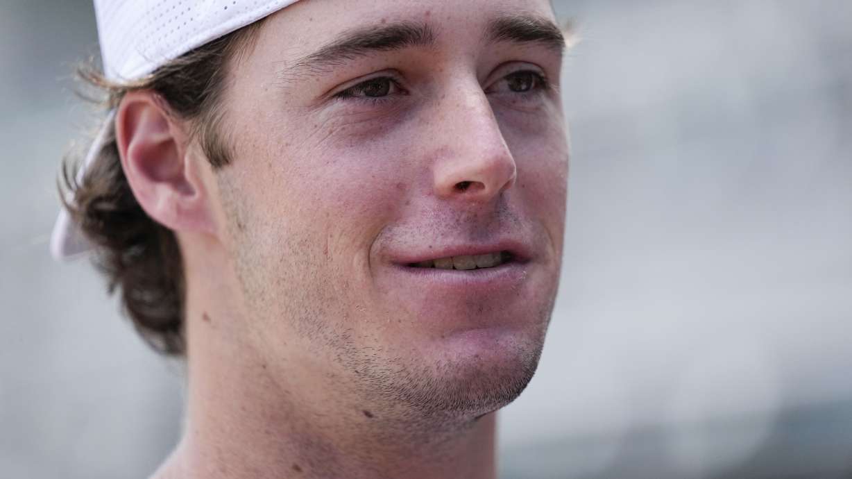 Georgia's Charlie Condon speaks to the media before an NCAA college baseball practice, Wednesday, May 15, 2024, in Athens, Ala.
