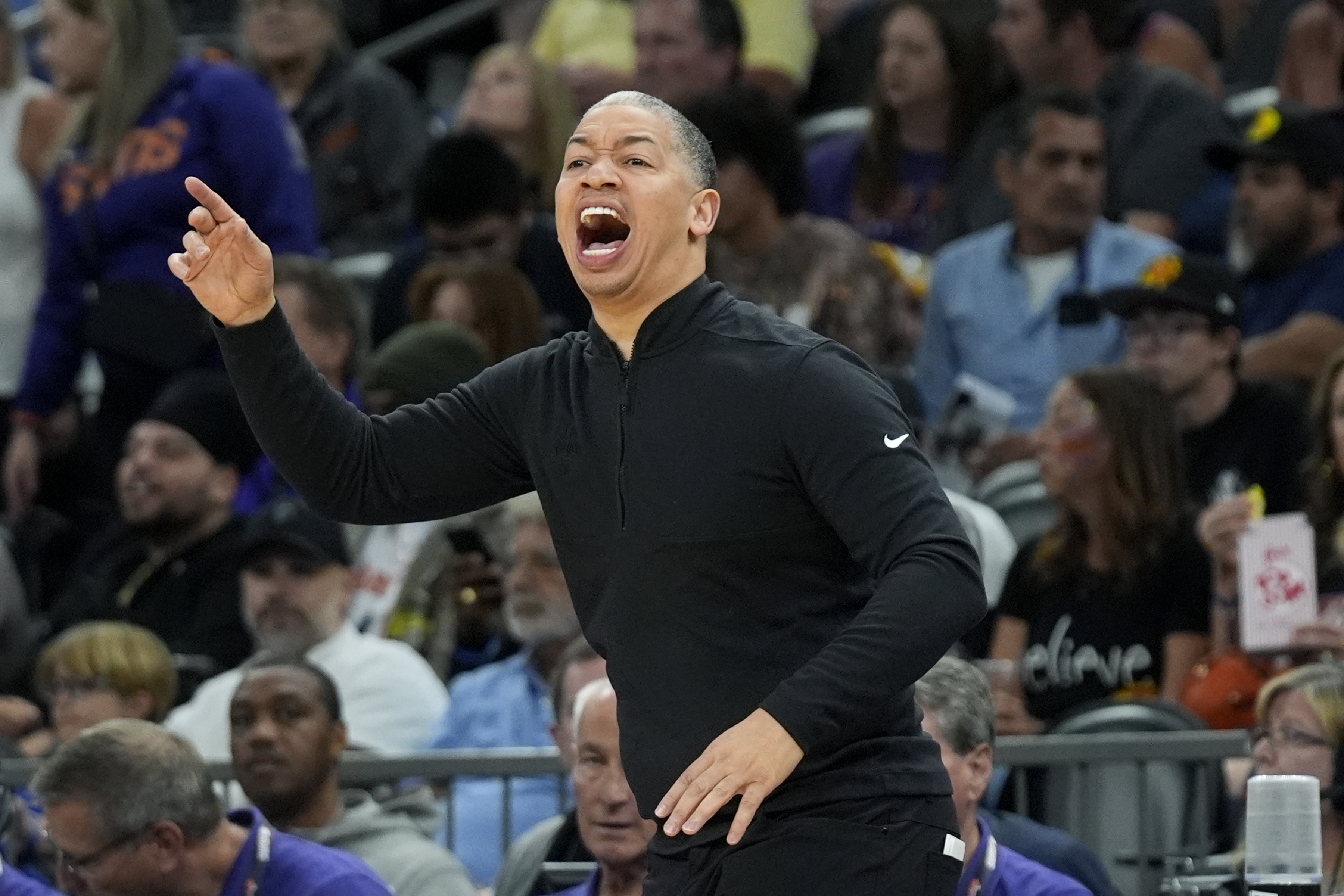 FILE -Los Angeles Clippers coach Tyron Lue shouts instructions to players during the first half of the team's NBA basketball game against the Phoenix Suns on Tuesday, April 9, 2024, in Phoenix. The Los Angeles Clippers have signed coach Tyronn Lue to a long-term contract after winning a division title in his fourth season, Wednesday, May 29, 2024. 