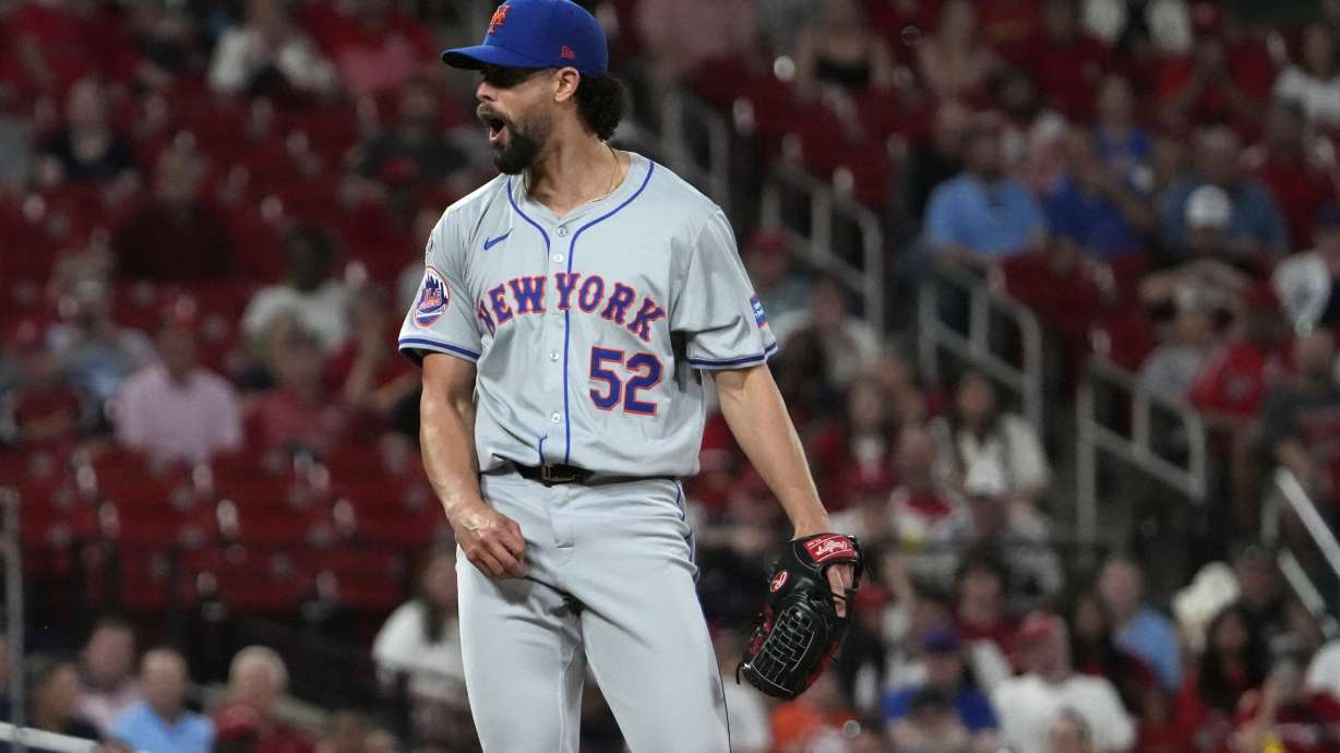 New York Mets relief pitcher Jorge Lopez reacts after striking out St. Louis Cardinals' Paul Goldschmidt with the bases loaded to end the seventh inning of a baseball game Tuesday, May 7, 2024, in St. Louis.