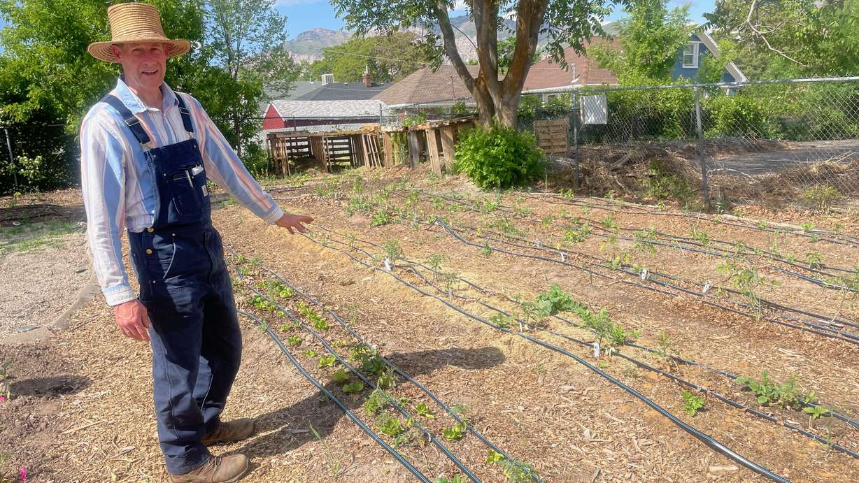 Karl Ebeling, who developed the Grow Ogden initiative, shows some of the produce grown by program participants on Tuesday.