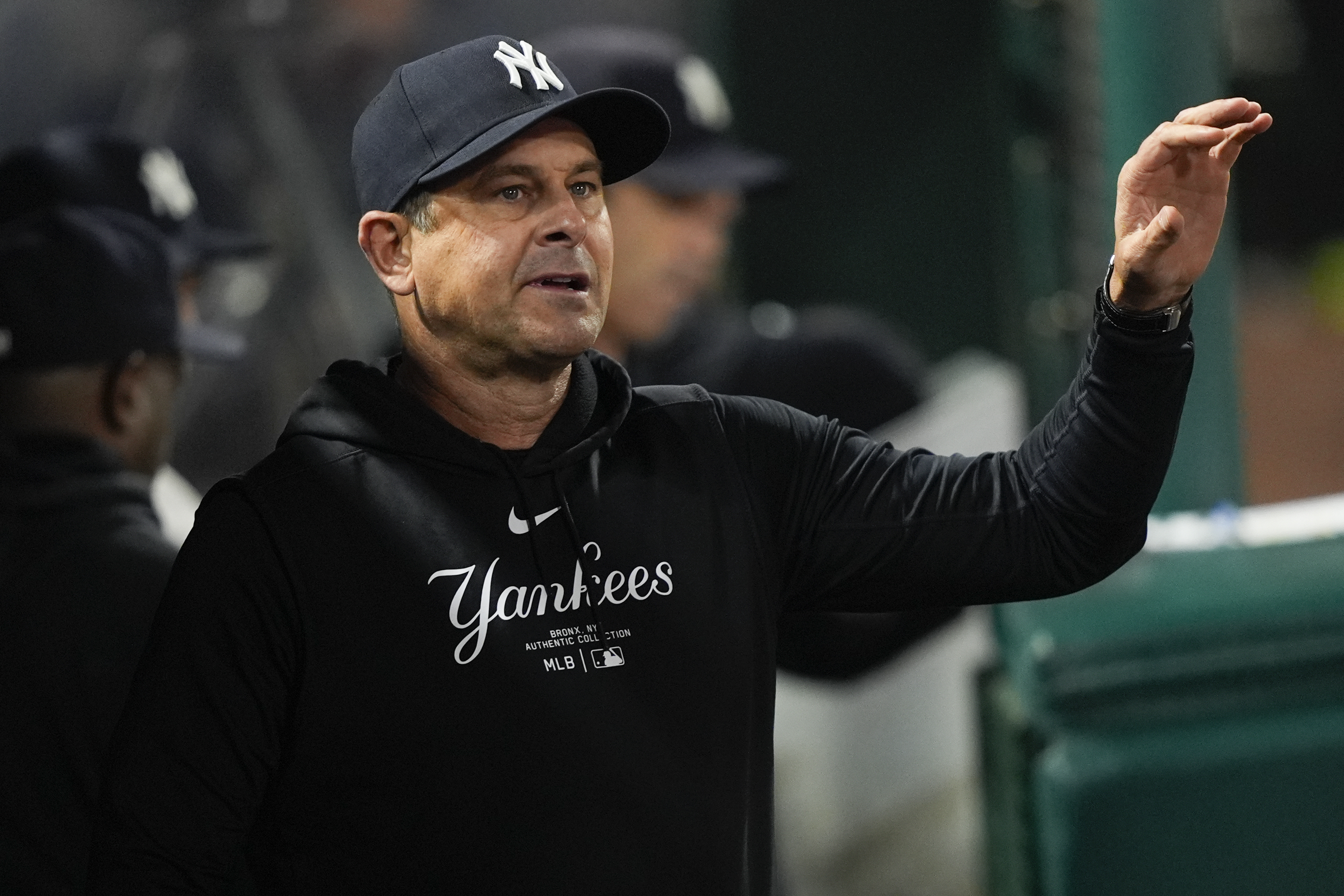 New York Yankees manager Aaron Boone walks in the dugout during the eighth inning of the team's baseball game against the Los Angeles Angels, Tuesday, May 28, 2024, in Anaheim, Calif. 