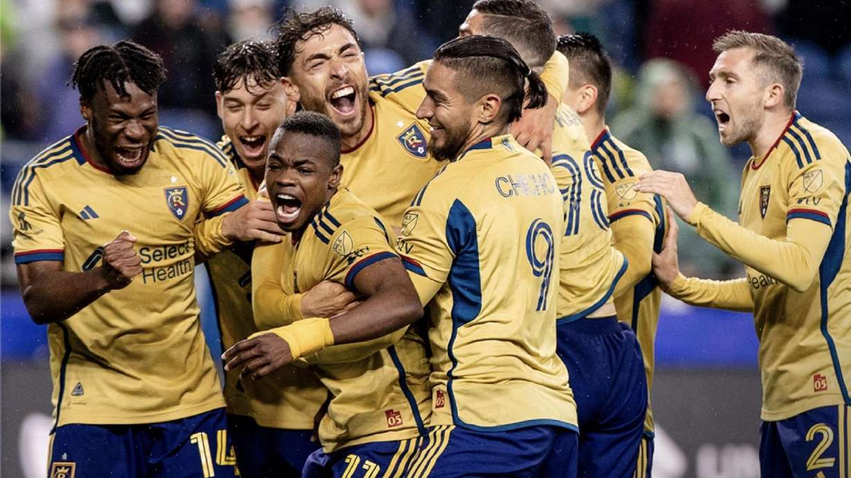 Real Salt Lake celebrates a stoppage time equalizer from Andres Gomez in Seattle.