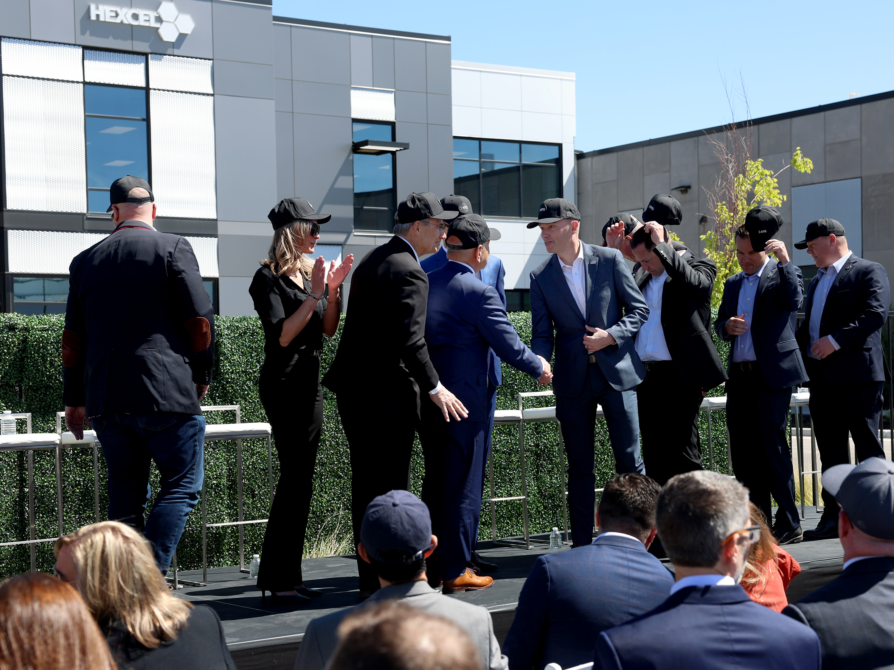 Gov. Spencer Cox, center, shakes hands with attendees of a press conference announcing the launch of Project Alta at Hexcel Corporation in West Valley City on Thursday.