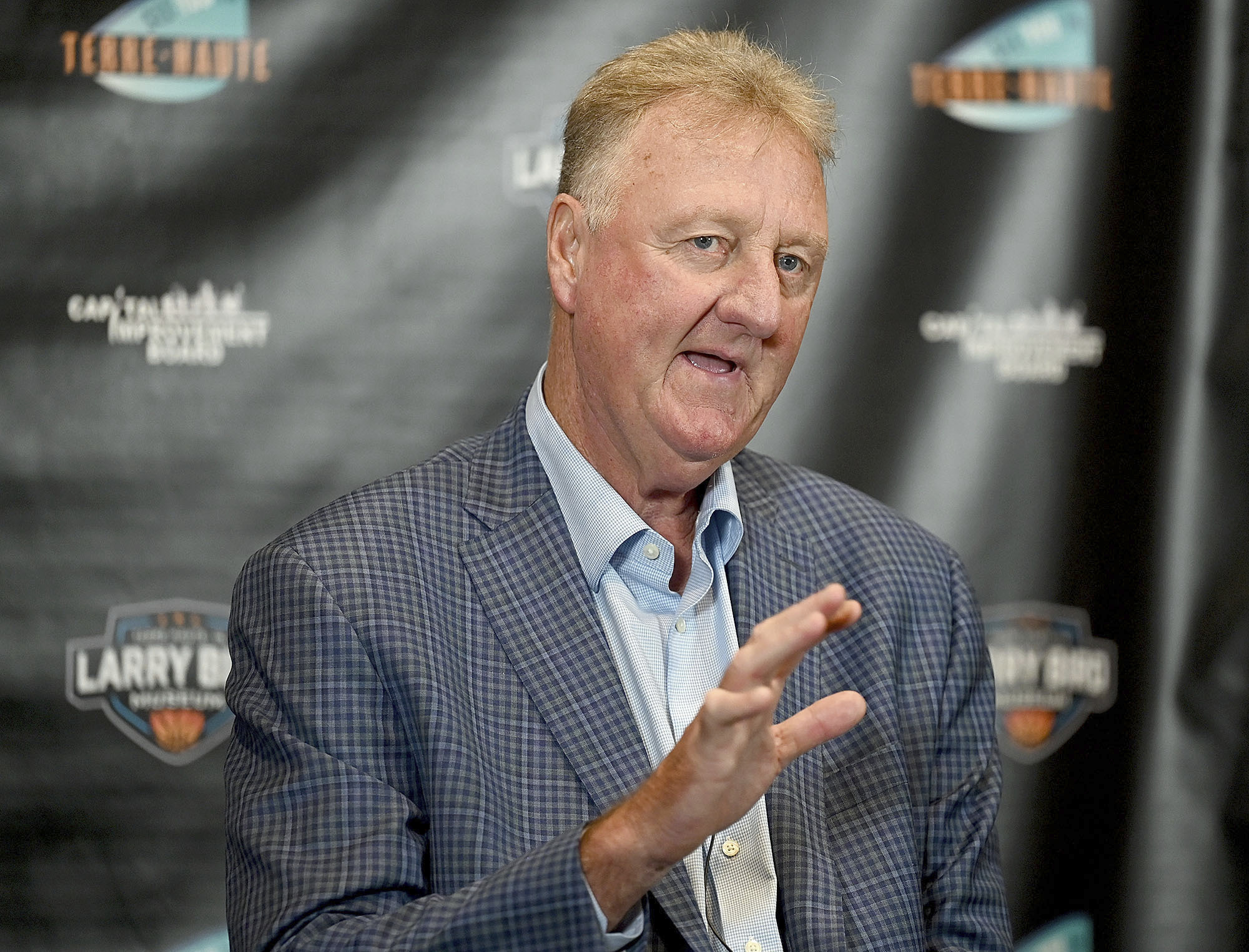 Indiana State University and Boston Celtics great Larry Bird explains how his former Springs Valley High School coach, Jim Jones, taught him to handle the ball during a press conference after the grand opening ceremony for the Larry Bird Museum, Thursday, May 30, 2024, in Terre Haute, Ind. 