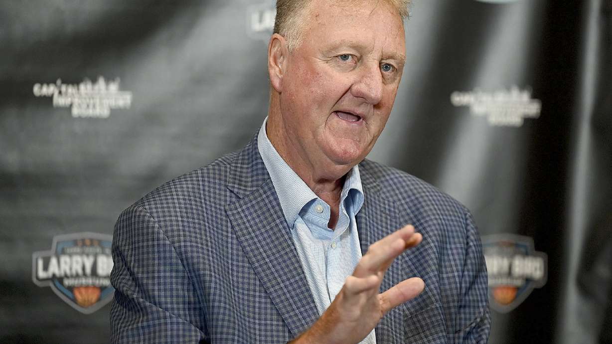Indiana State University and Boston Celtics great Larry Bird explains how his former Springs Valley High School coach, Jim Jones, taught him to handle the ball during a press conference after the grand opening ceremony for the Larry Bird Museum, Thursday, May 30, 2024, in Terre Haute, Ind.