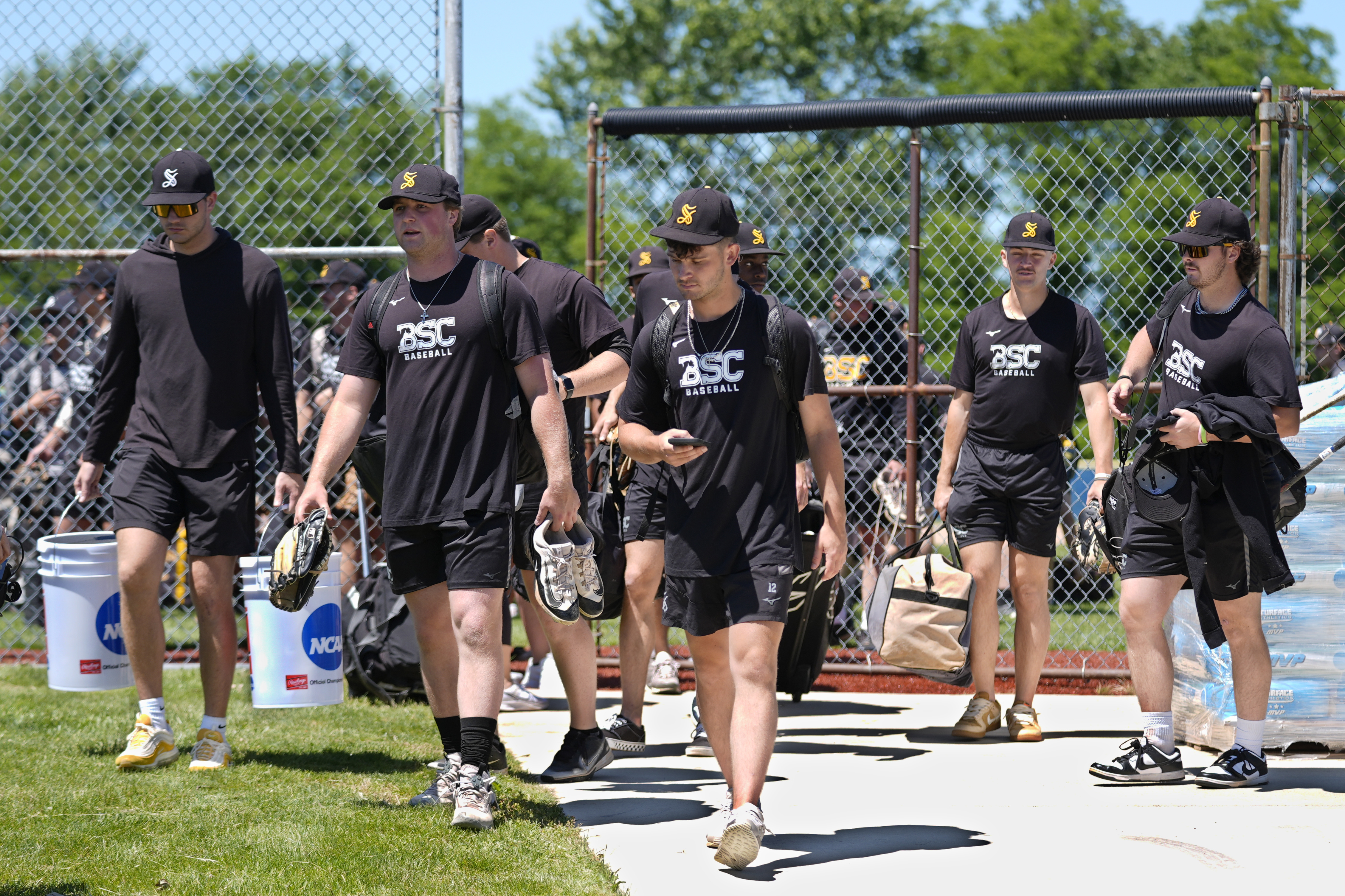Birmingham-Southern players leave a practice Thursday, May 30, 2024, in Kirtland, Ohio. On Friday, the Panthers will continue an unexpected, uplifting season that has captured hearts across the country by playing in the Division III World Series on the same day the liberal arts college founded on the eve of the Civil War shuts its doors. 