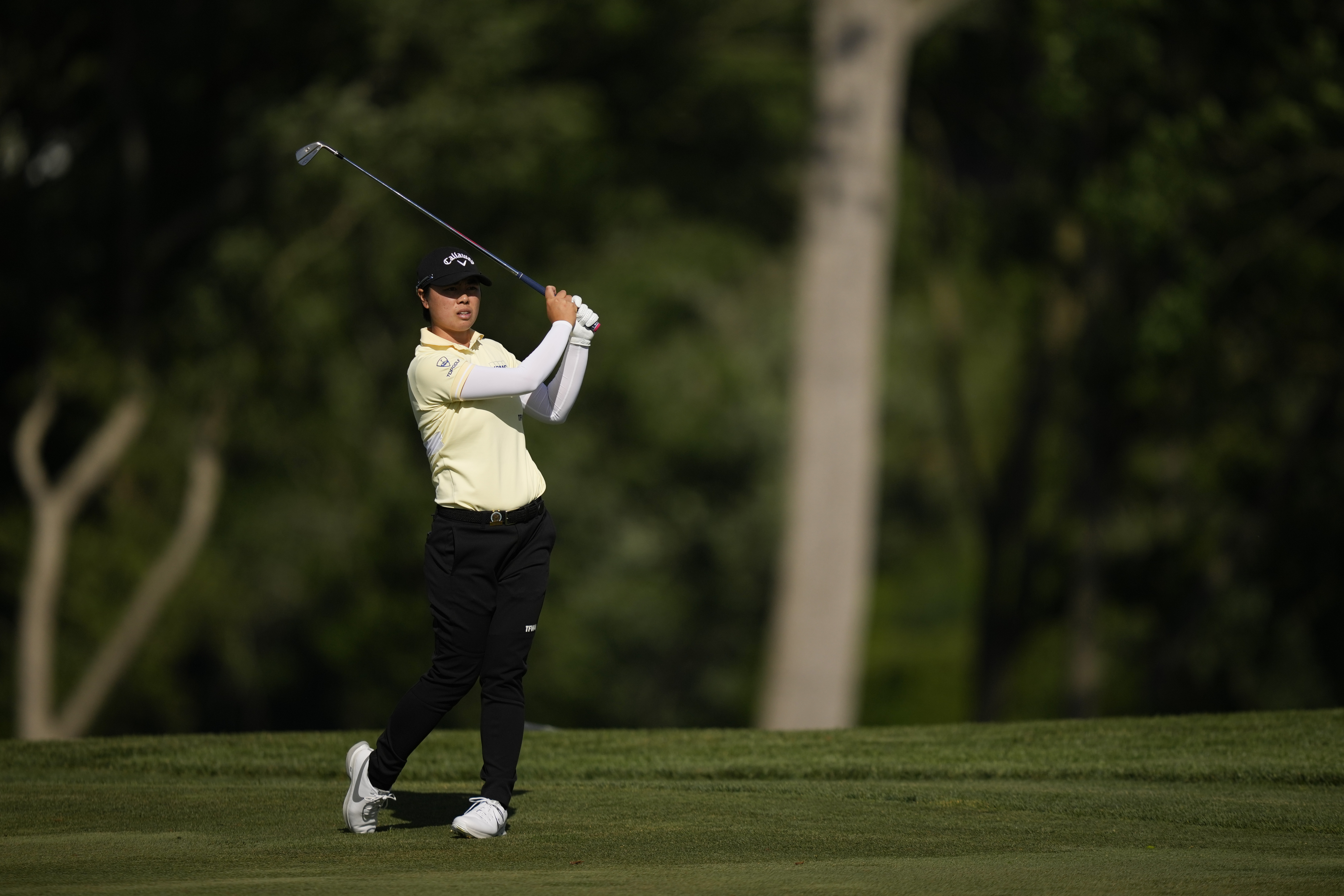 Yuka Saso, of Japan, hits from the fairway on the ninth hole during the first round of the U.S. Women's Open golf tournament at Lancaster Country Club, Thursday, May 30, 2024, in Lancaster, Pa. 