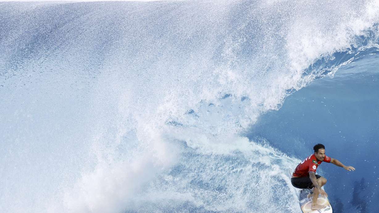 Surfer Italo Ferreira of Brazil competes on his way to winning the latest competition of the World Surf League Championship Tour in Teahupoʻo in Tahiti on May 30, 2024.