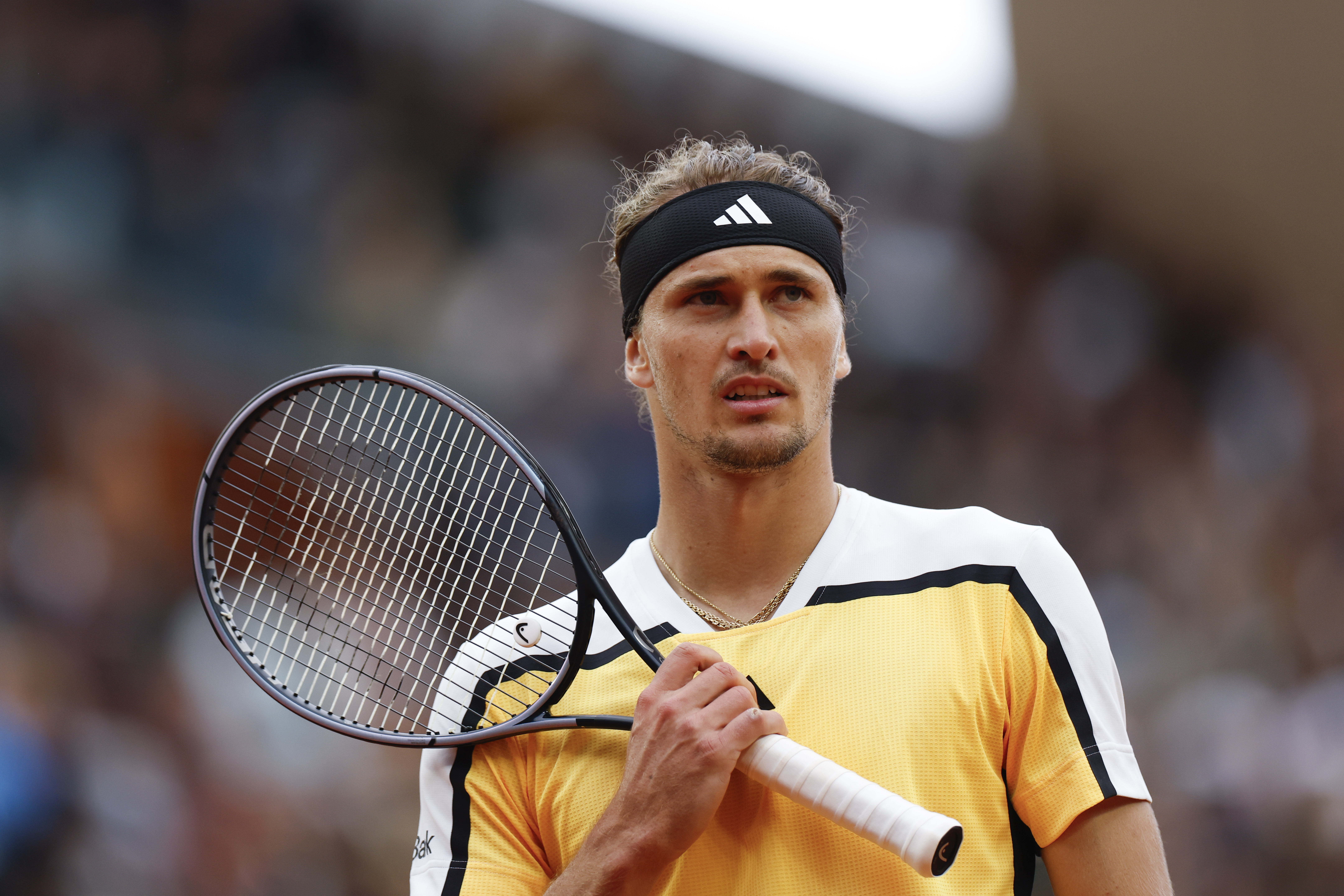 Germany's Alexander Zverev walks to the baseline during his second round match of the French Open tennis tournament against Belgium's David Goffin at the Roland Garros stadium in Paris, Thursday, May 30, 2024. 