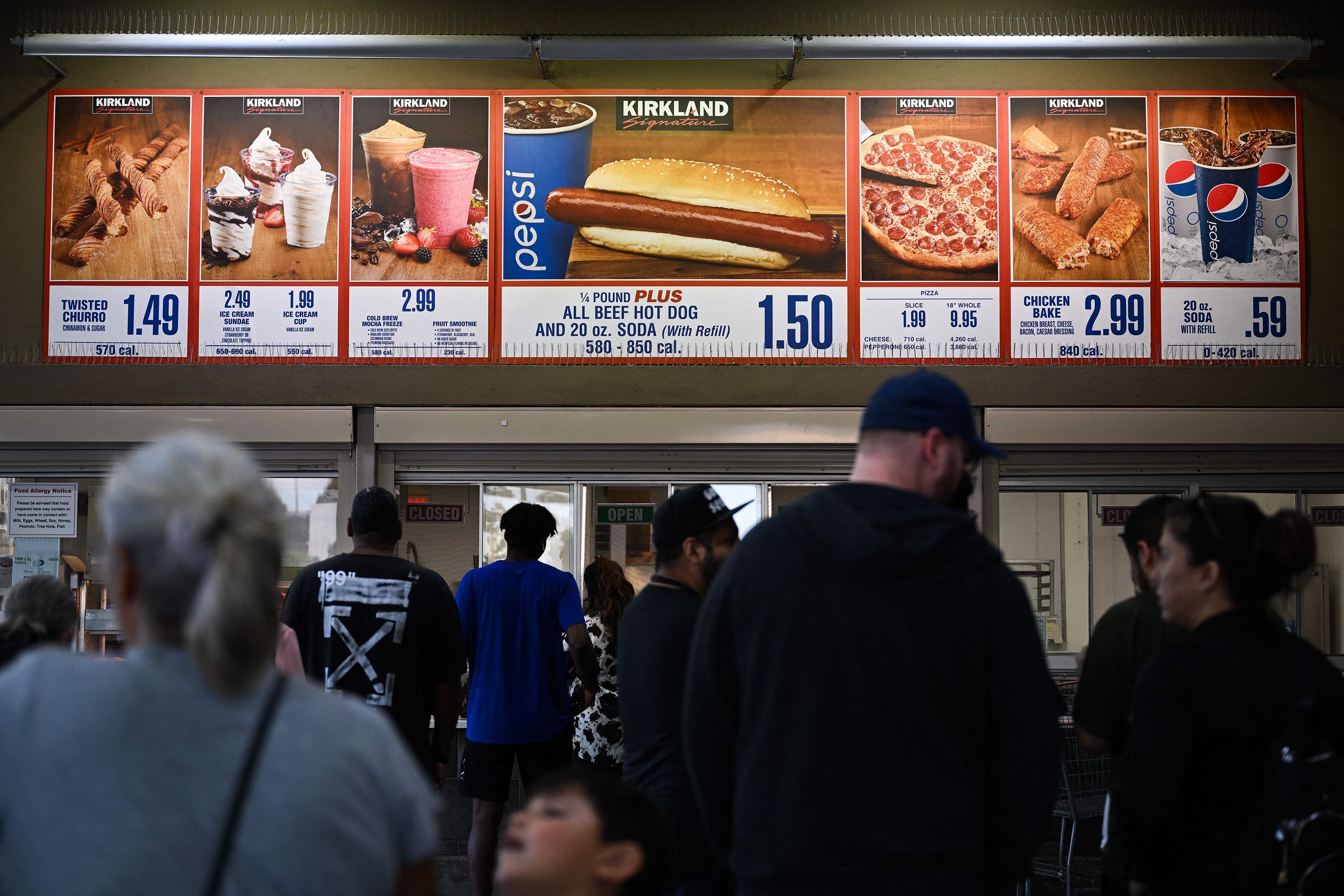 Costco’s new chief financial officer has a reassuring message for inflation-weary customers: don’t worry about the price of the $1.50 hot dog-soda combo.