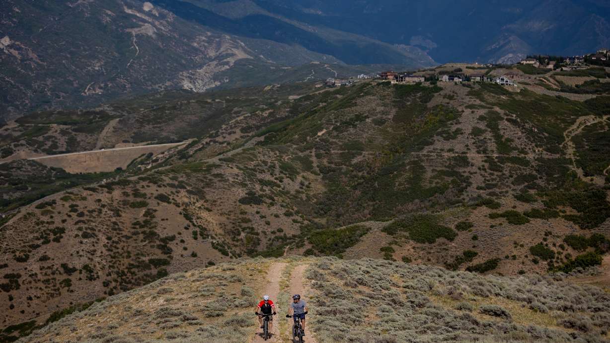 Draper Mayor Troy Walker and City Manager David Dobbins on a biking tour of the Corner Canyon trail network on Aug. 25, 2021. Lehi has approved a conservation easement with Draper to preserve 900 acres of open space in Traverse Mountain.