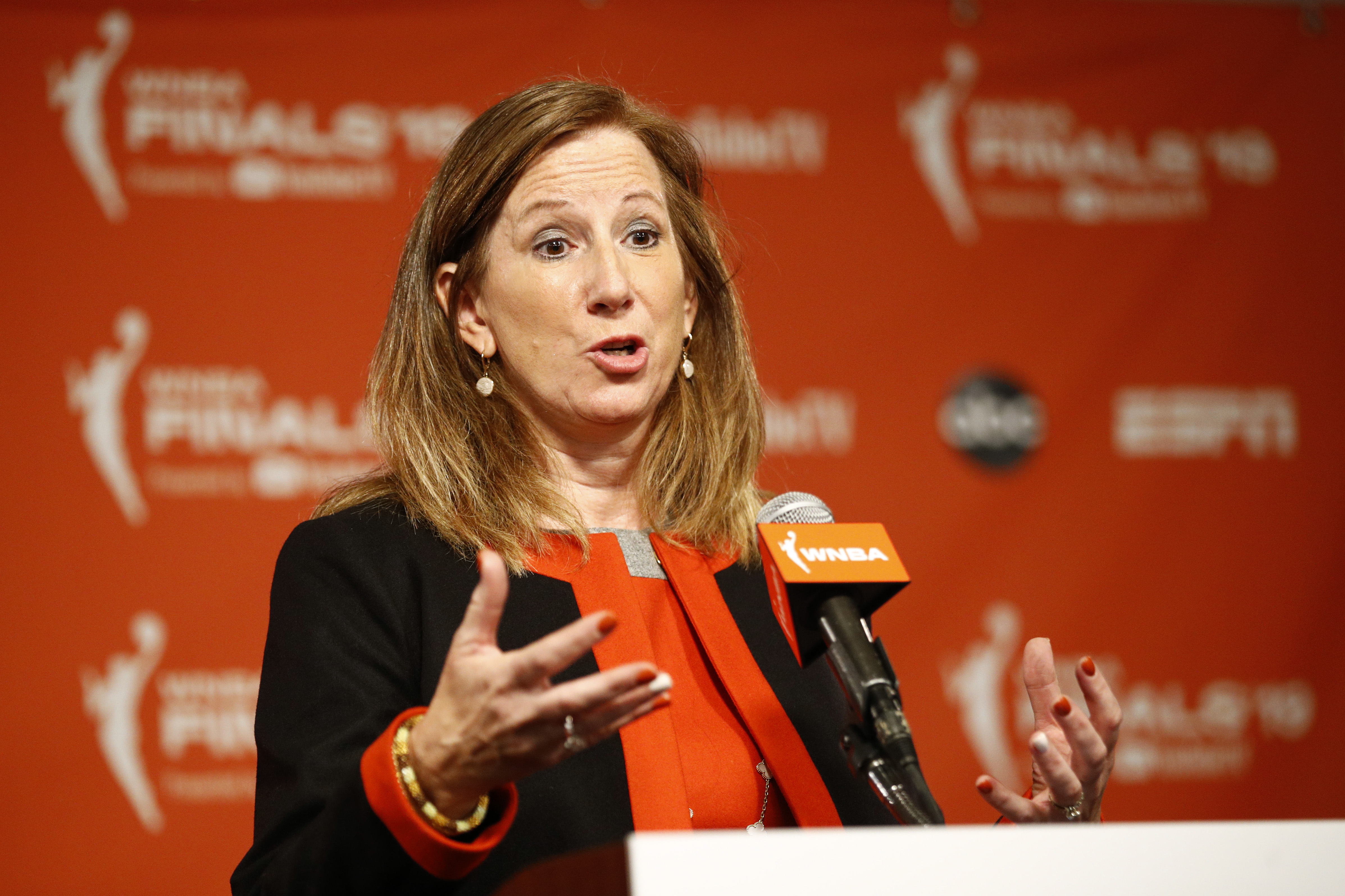 FILE - WNBA Commissioner Cathy Engelbert speaks at a news conference before Game 1 of basketball's WNBA Finals between the Connecticut Sun and the Washington Mystics, Sunday, Sept. 29, 2019, in Washington. Pulling together its charter flight program in the span of a few weeks caused a couple of early hiccups for the WNBA. The league plans to have everything running smoothly after the Olympic break. “It’s a big Rubik’s cube,” WNBA Commissioner Cathy Engelbert told The Associated Press in a phone interview Friday, May 31, 2024. 