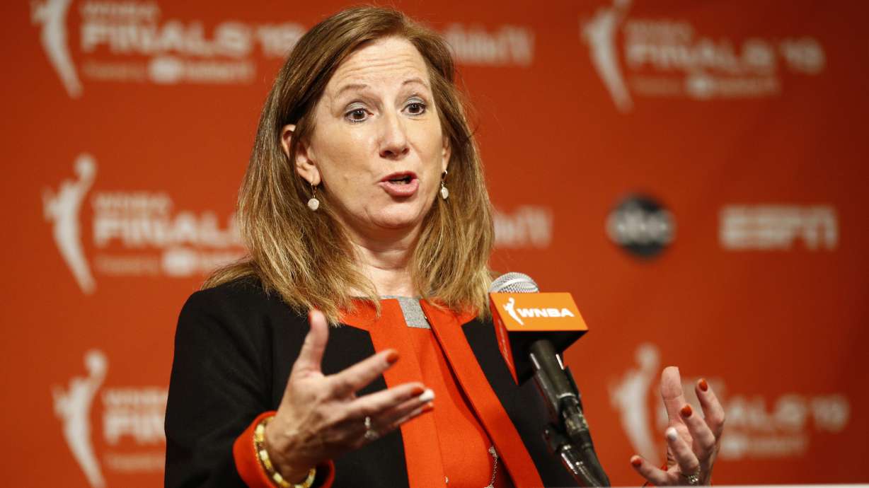 FILE - WNBA Commissioner Cathy Engelbert speaks at a news conference before Game 1 of basketball's WNBA Finals between the Connecticut Sun and the Washington Mystics, Sunday, Sept. 29, 2019, in Washington. Pulling together its charter flight program in the span of a few weeks caused a couple of early hiccups for the WNBA. The league plans to have everything running smoothly after the Olympic break. “It’s a big Rubik’s cube,” WNBA Commissioner Cathy Engelbert told The Associated Press in a phone interview Friday, May 31, 2024.