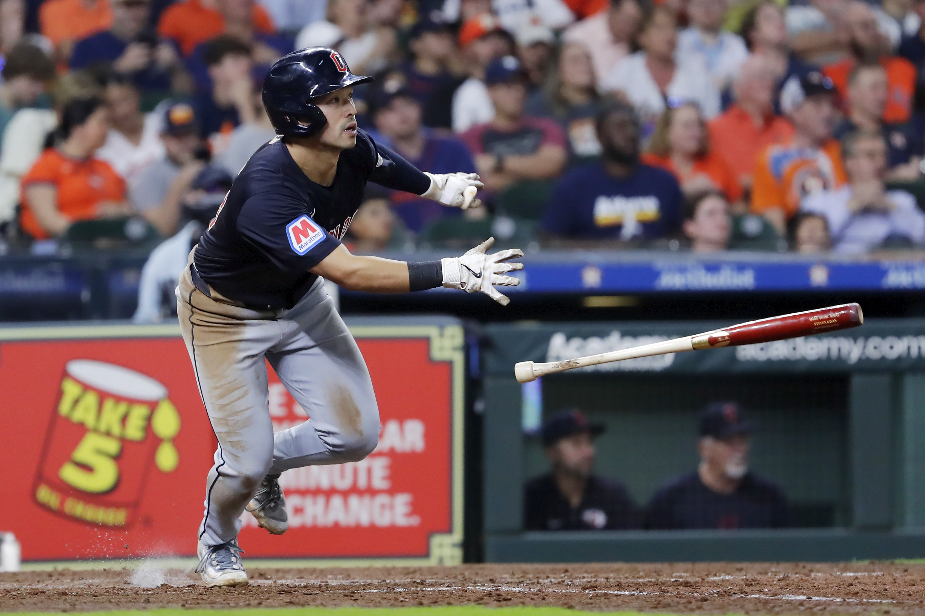 FILE - Cleveland Guardians' Steven Kwan tosses his bat as he watches his hit for a triple against the Houston Astros during the sixth inning of a baseball game Tuesday, April 30, 2024, in Houston. Cleveland placed outfielder Steven Kwan, who leads the AL with a .353 average, on the 10-day injured list Monday, May 6, 2024, with a strained hamstring he sustained while running down a fly ball over the weekend.