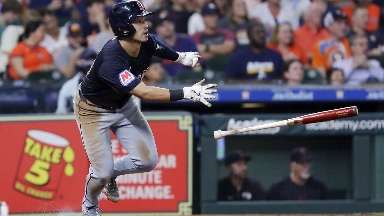 FILE - Cleveland Guardians' Steven Kwan tosses his bat as he watches his hit for a triple against the Houston Astros during the sixth inning of a baseball game Tuesday, April 30, 2024, in Houston. Cleveland placed outfielder Steven Kwan, who leads the AL with a .353 average, on the 10-day injured list Monday, May 6, 2024, with a strained hamstring he sustained while running down a fly ball over the weekend.