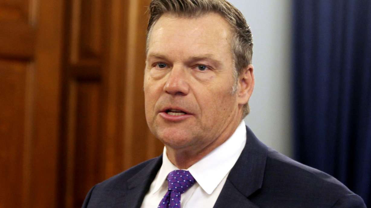 Kansas Attorney General Kris Kobach speaks during a news conference, Thursday at the Statehouse in Topeka, Kan. The Kansas Supreme Court's majority has held that there is no state constitutional right to vote in the state.