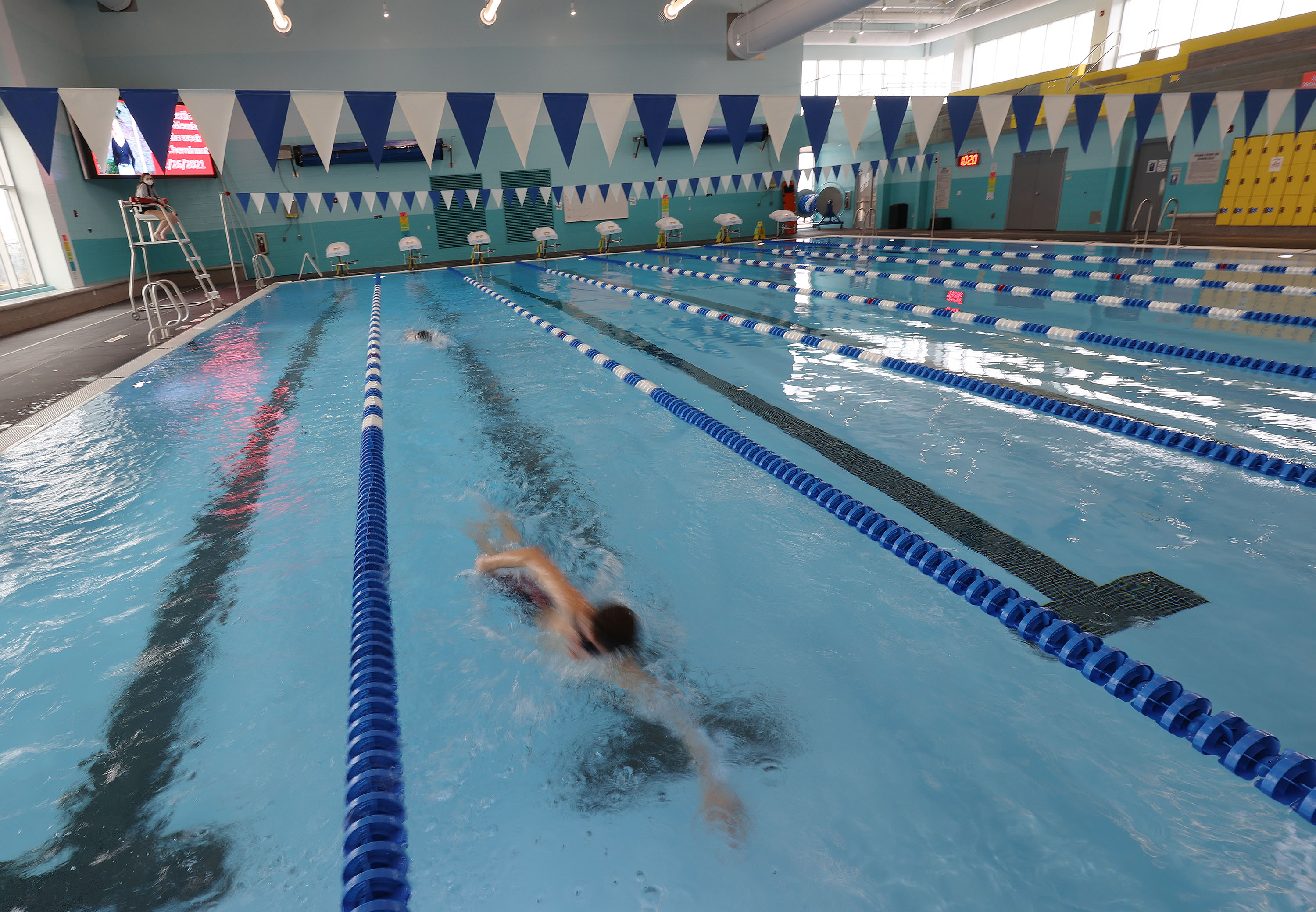 A swimmer swims laps at the Draper Recreation Center in Draper on Feb. 26, 2021. A new pass offers Salt Lake County school-age children access to all 21 of the county's aquatic and ice centers and nine outdoor pools at no additional cost.