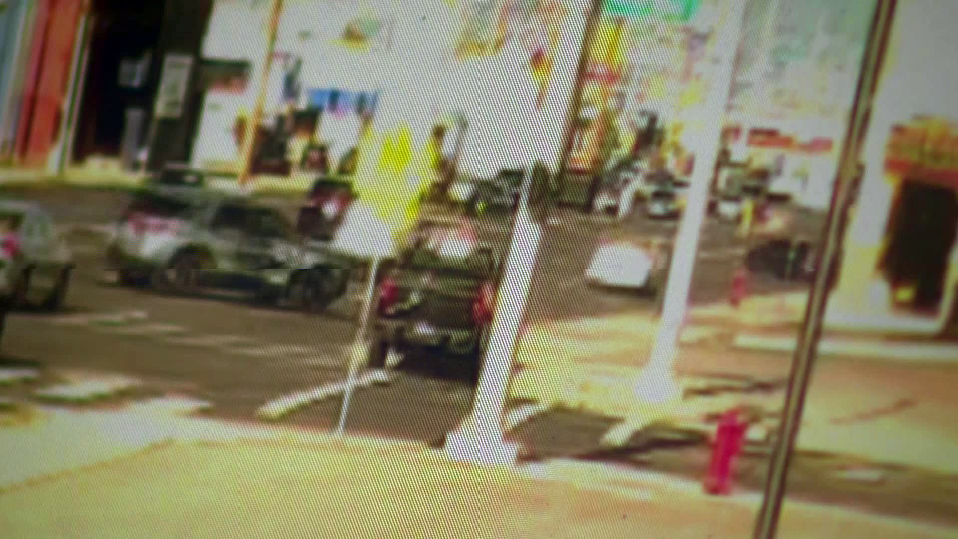 A Unified police officer begins to chase a white car as it allegedly fled the scene of a crash in Kearns Thursday.