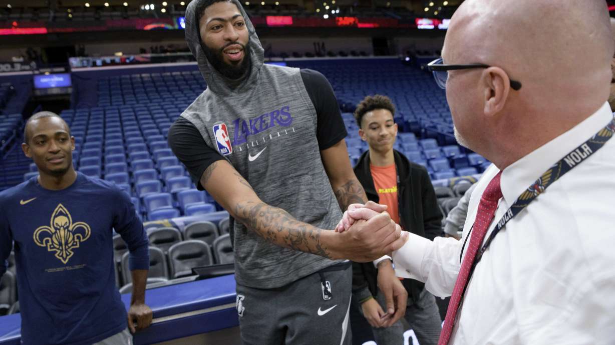 Los Angeles Lakers forward Anthony Davis greets New Orleans Pelicans Executive Vice President of Basketball Operations David Griffin before an NBA basketball game in New Orleans, Wednesday, Nov. 27, 2019. The Pelicans have opted to wait until 2025 to use the last of the three first-round draft choices they received from the Lakers as part of the 2019 Anthony Davis trade, a person familiar with the decision told The Associated Press, Saturday, June 1, 2024.