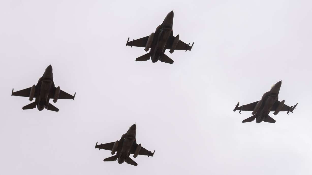 F-16 fighter jets perform a maneuver as part of the African Lion military exercise, in Tantan, south of Agadir, Morocco, Friday.