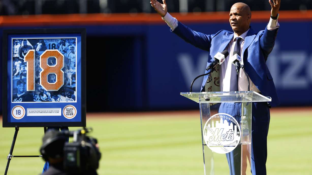 Former New York Mets outfielder Darryl Strawberry acknowledges fans during ceremony to retire his number at Citi Field, Saturday, June 1, 2024, in New York.
