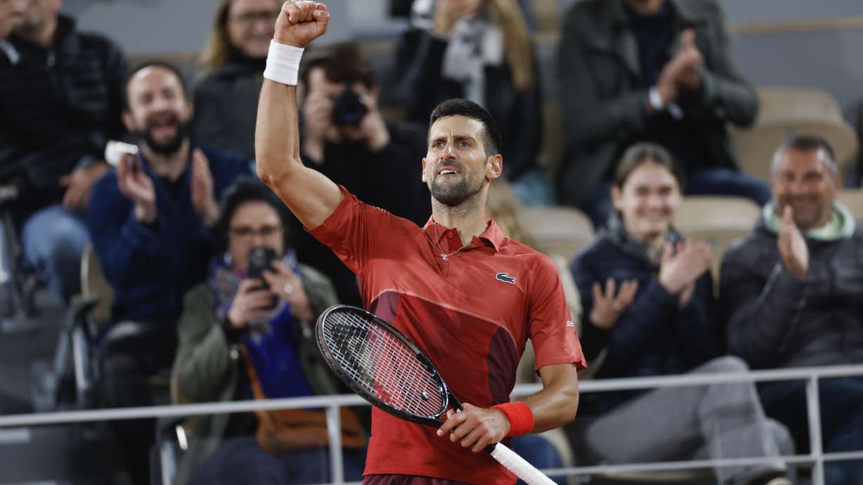 Serbia's Novak Djokovic clenches his fist after breaking the service game of Italy's Lorenzo Musetti in the fifth set of the third round match of the French Open tennis tournament at the Roland Garros stadium in Paris, Sunday, June 2, 2024.