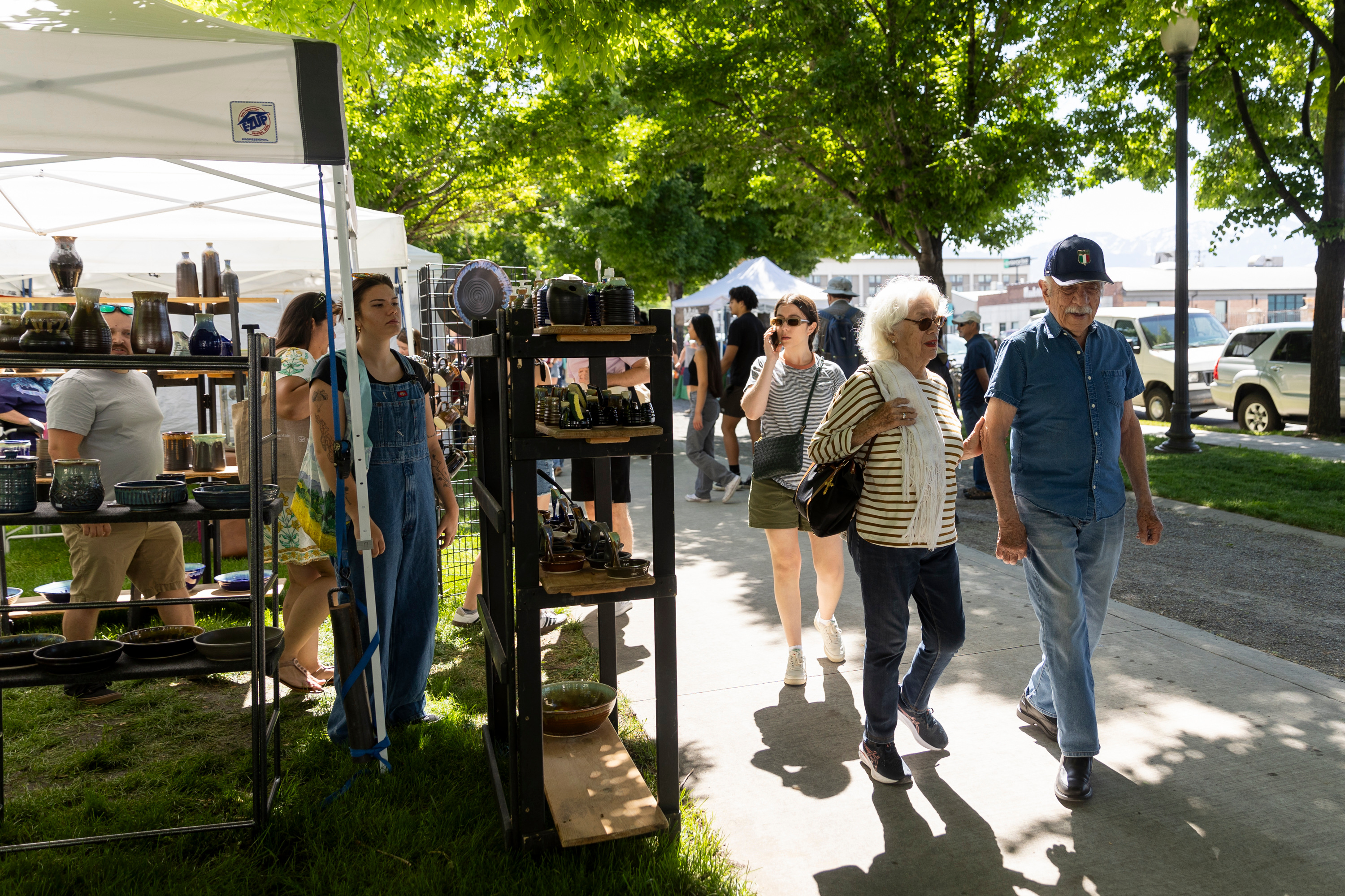 People attend the Salt Lake City Farmer’s Market at Pioneer Park in Salt Lake City, on Saturday.