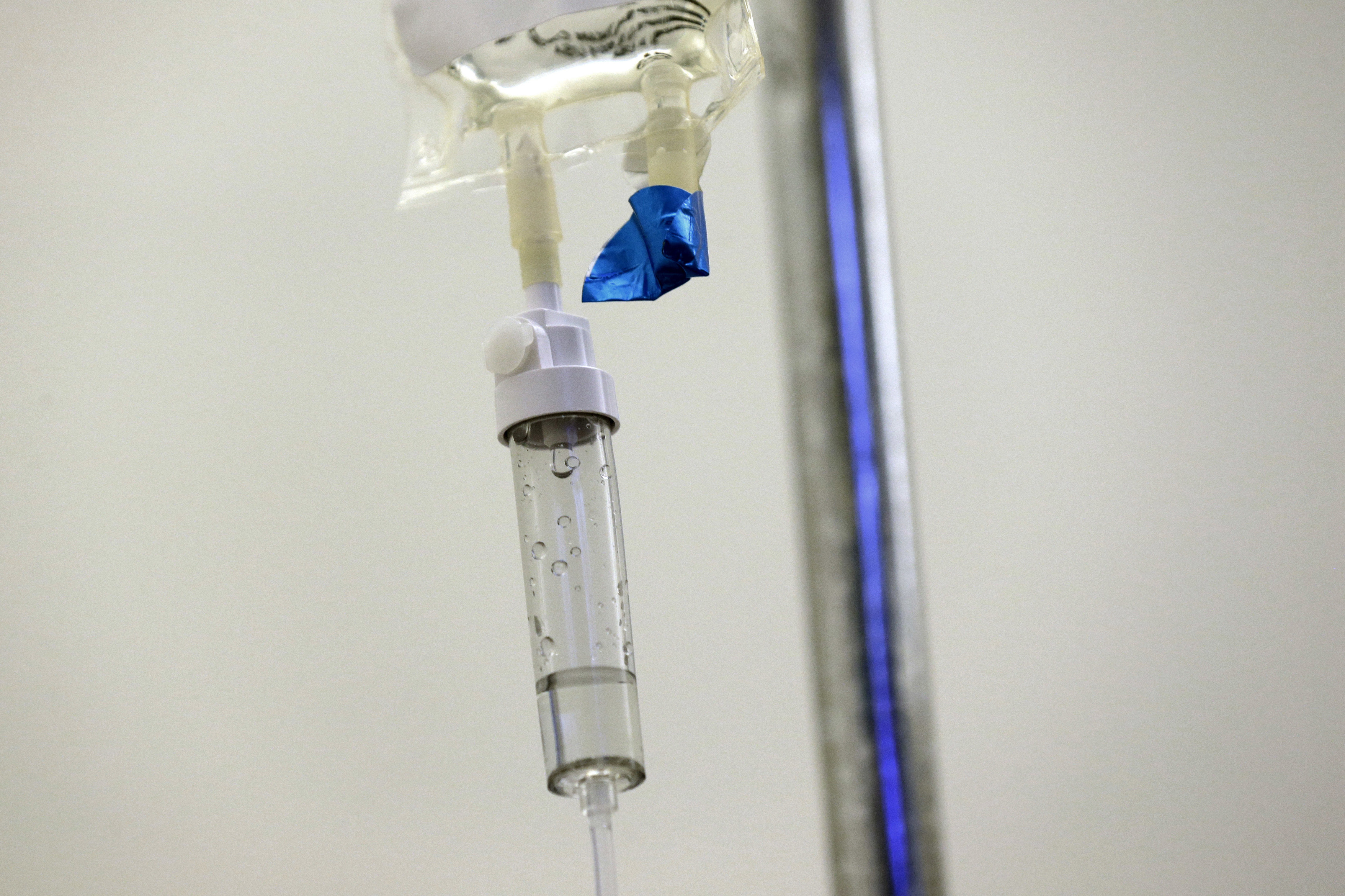 Chemotherapy drugs are administered to a patient at a hospital in Chapel Hill, N.C. Scaling back treatment in some cancers — ovarian, esophageal and Hodgkin lymphoma — can make life easier for patients without compromising outcomes, doctors reported at the American Society of Clinical Oncology annual meeting in early June 2024.