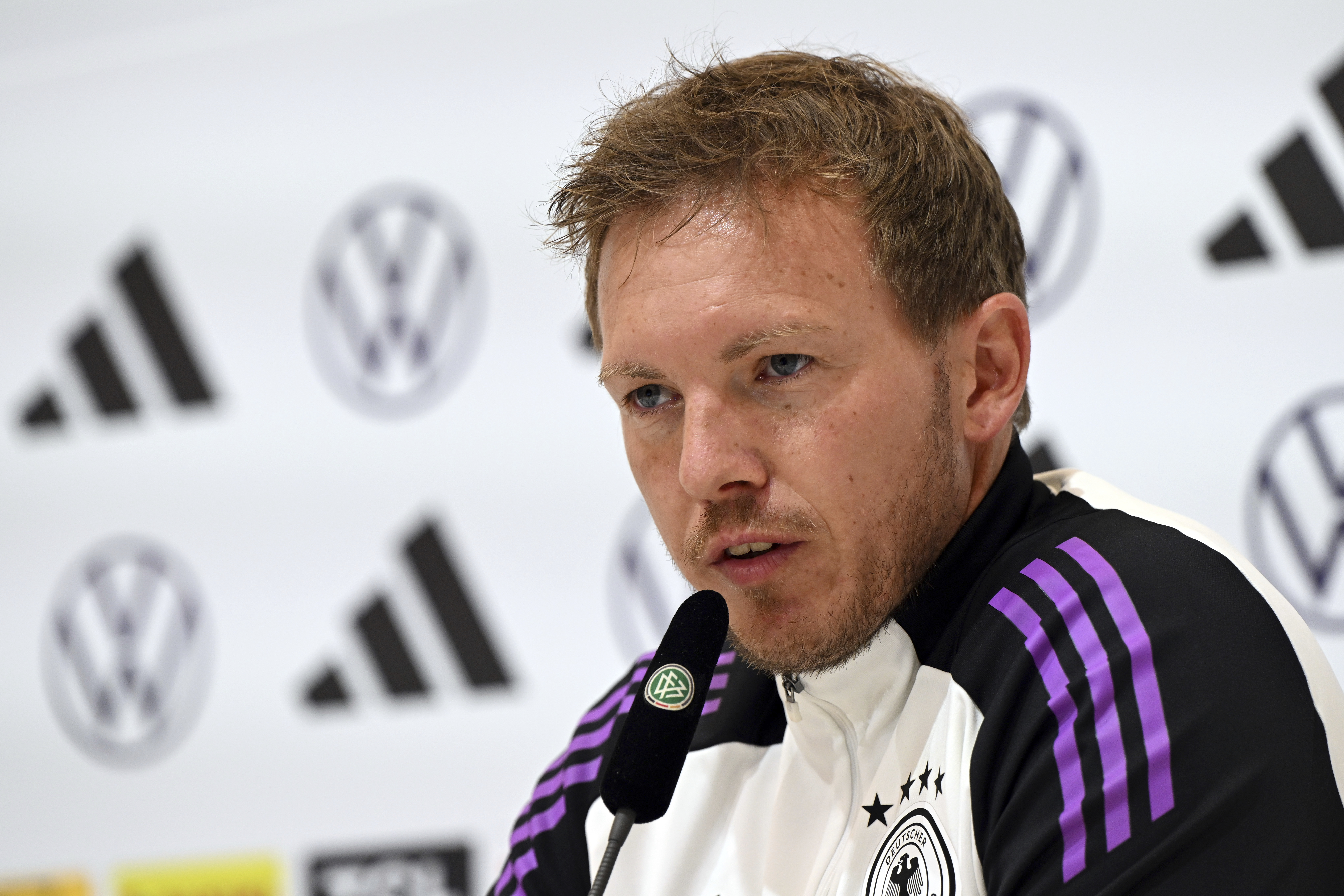 Germany's head coach Julian Nagelsmann attends a press conference of the German national soccer team in Herzogenaurach, Germany, Sunday, June 2, 2024, ahead of the European Championship test match between Germany and Ukraine on Monday, June 3. Nagelsmann says he was shocked by a public broadcaster’s survey that asked participants if they would prefer more white players on his team. 