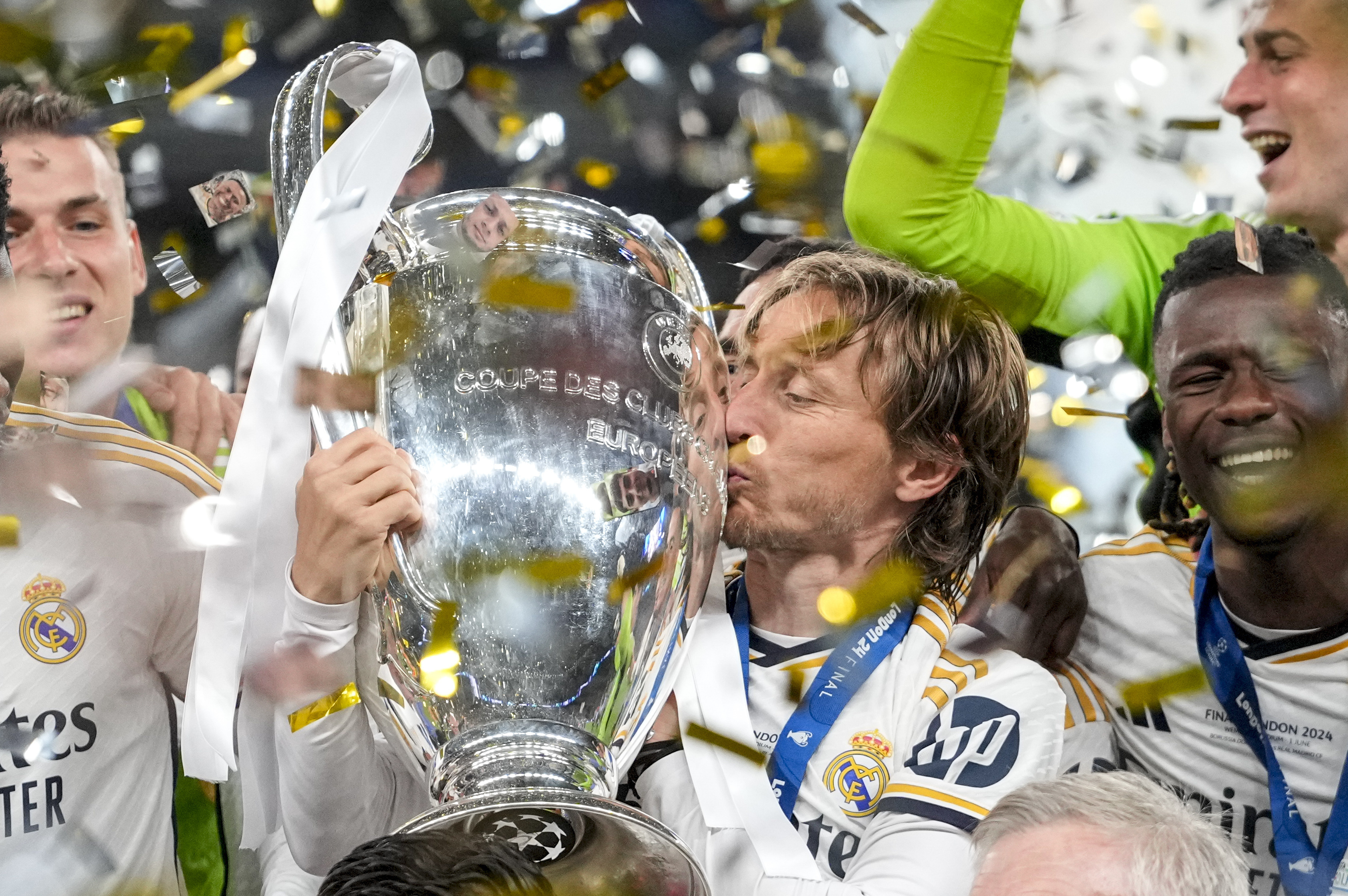 Real Madrid's Luka Modric kisses the trophy after winning the Champions League final soccer match between Borussia Dortmund and Real Madrid at Wembley stadium in London, Saturday, June 1, 2024. 