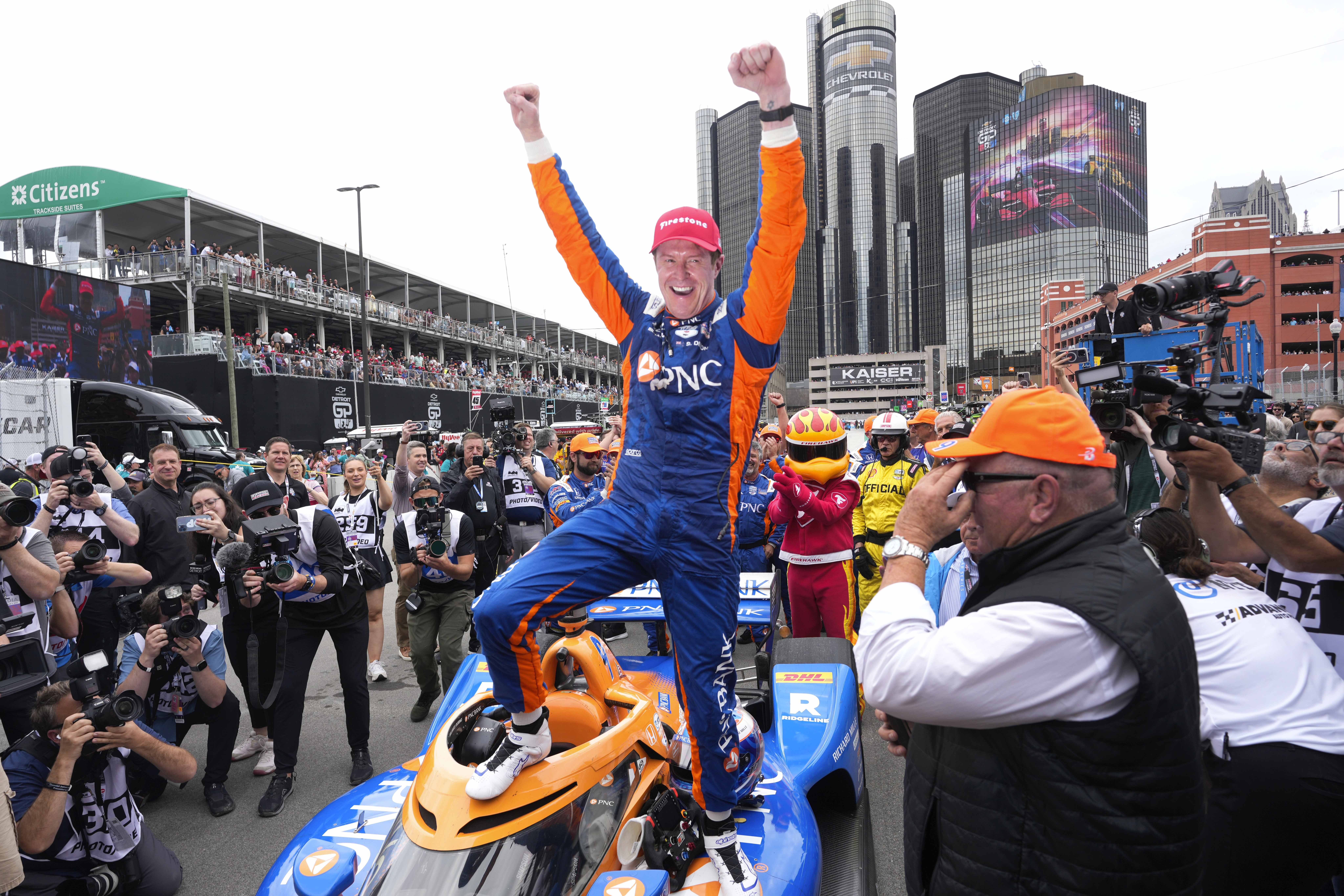 Scott Dixon celebrates winning the IndyCar Detroit Grand Prix auto race in Detroit, Sunday, June 2, 2024. 