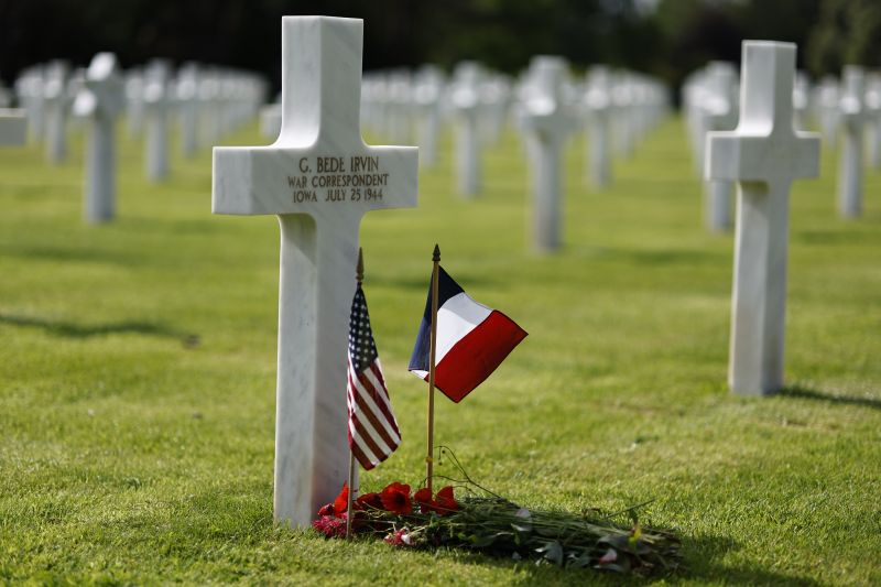 The headstone of Associated Press photographer Bede Irvin at the Normandy American Cemetery in Colleville-sur-Mer, France on Monday. Bede Irvin was killed July 25, 1944 near the Normandy town of Saint-Lo as he was photographing an Allied bombardment.