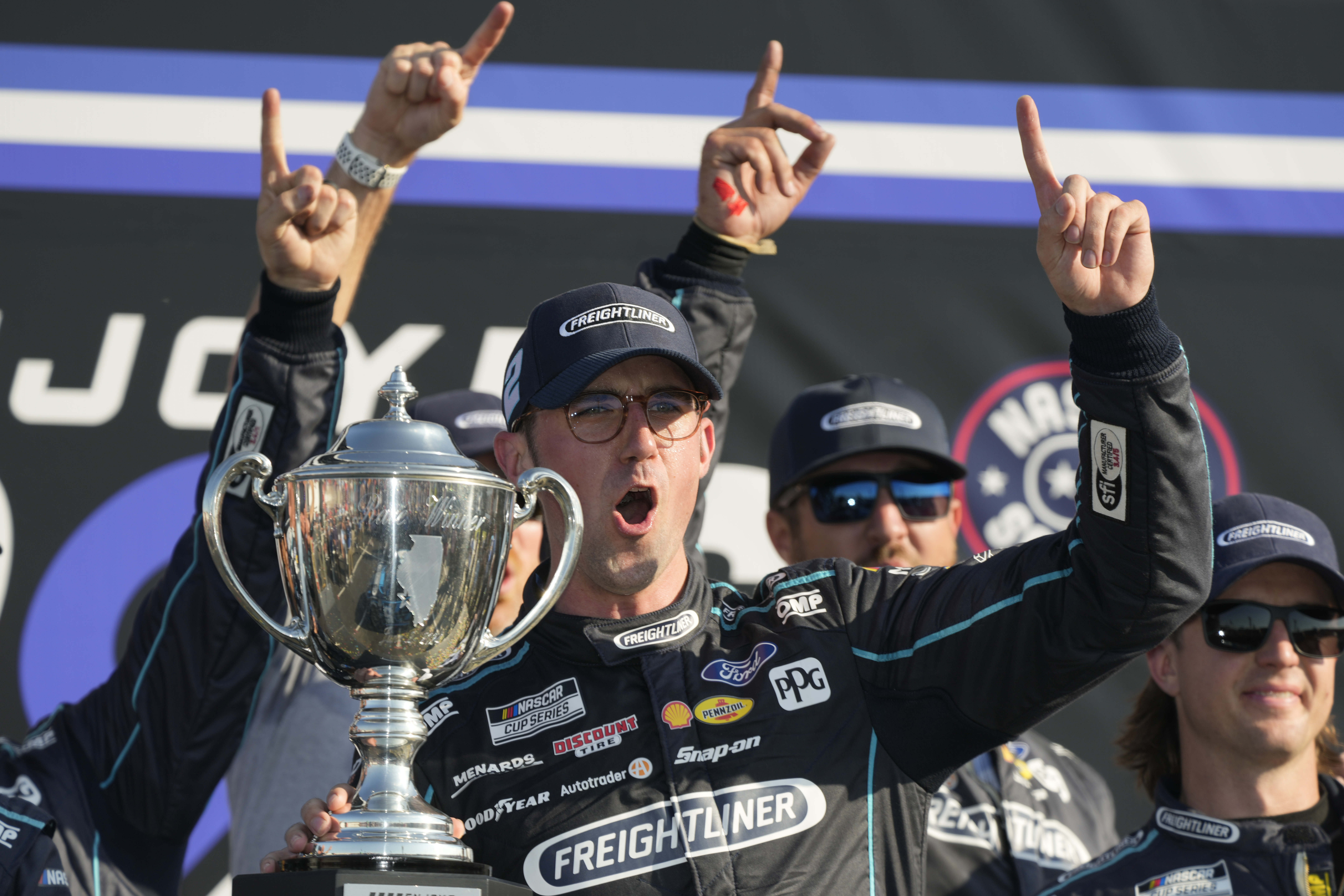 Austin Cindric celebrates after winning a NASCAR Cup Series auto race at World Wide Technology Raceway Sunday, June 2, 2024, in Madison, Ill.