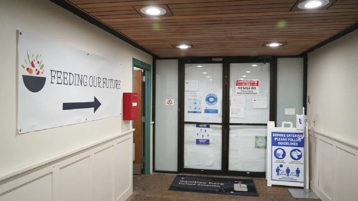 The office of Feeding Our Future is seen, Jan. 27, 2022, in St. Anthony, Minn. A juror was dismissed Monday after reporting that a woman dropped a bag of cash at her home and offered her more money if she would vote to acquit.