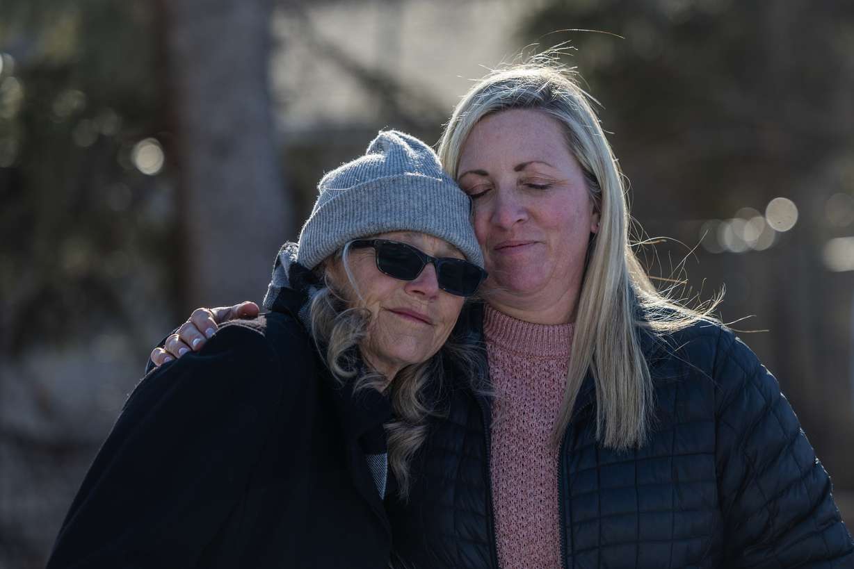 Ann Marie Herpich, left, sister to Jordan Rasmussen, hugs Lisa Rasmussen Opfar, Jordan’s daughter, at Wasatch Lawn Memorial Park and Mortuary in Millcreek on March 5, 2023.