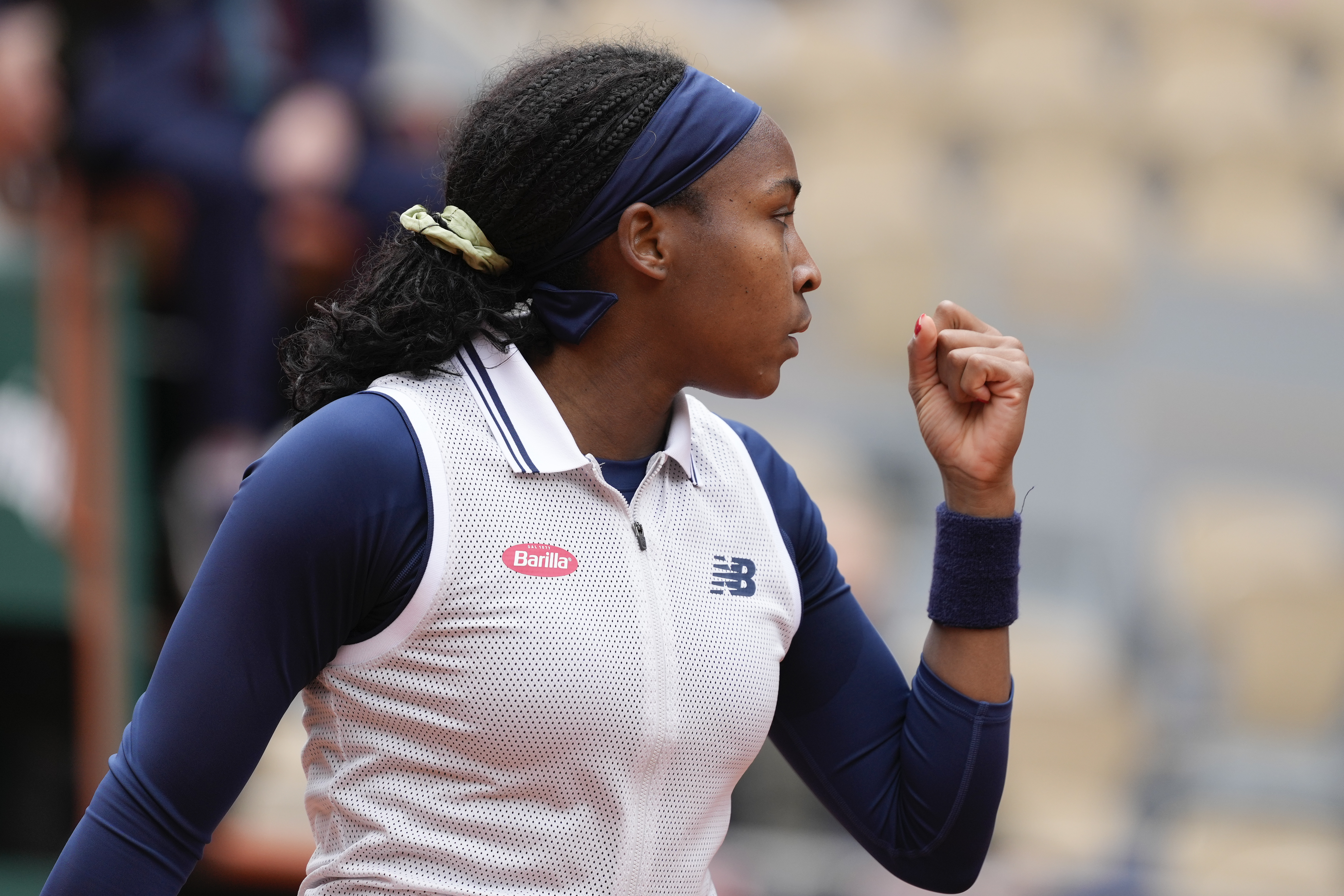 Coco Gauff of the U.S. clenches her fist after scoring a point against Italy's Elisabetta Cocciaretto during their fourth round match of the French Open tennis tournament at the Roland Garros stadium in Paris, Sunday, June 2, 2024. 