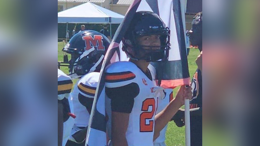 McCarty is pictured in his high school football gear. McCarty was leaving the Murray North Trax Station near 4500 S. and Main Street when he and two other friends were shot.