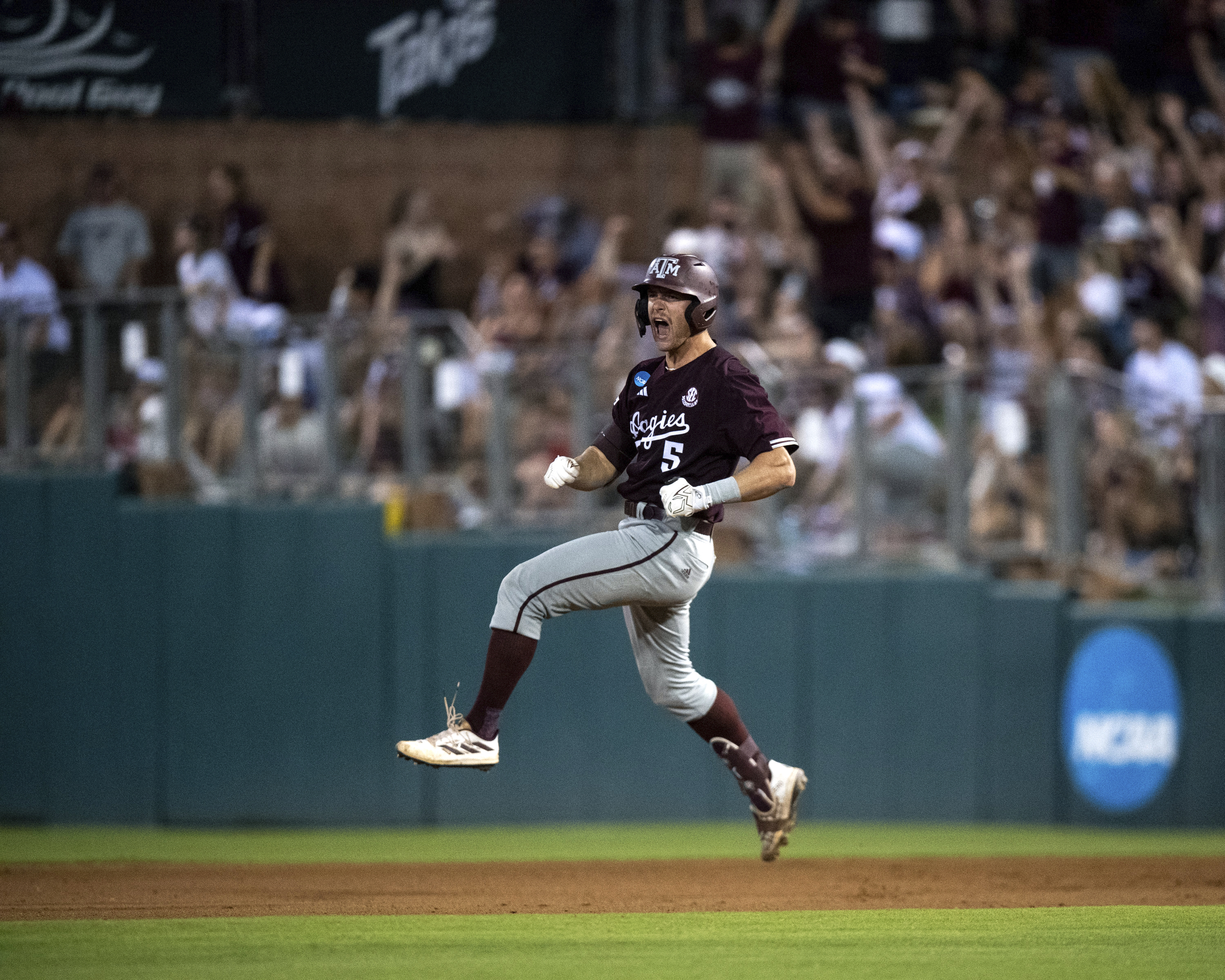 Texas A&M outfielder Hayden Schott (5) celebrates a solo home run against Louisiana during the fifth inning of the Bryan-College Station Regional NCAA baseball game, Sunday, June 2, 2024, in College Station, Texas. 