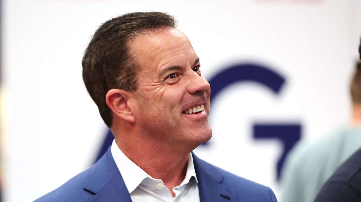 U.S. Senate candidate Brad Wilson talks with attendees at the Lincoln Day GOP fundraising dinner at Utah Valley University in Orem on March 16.