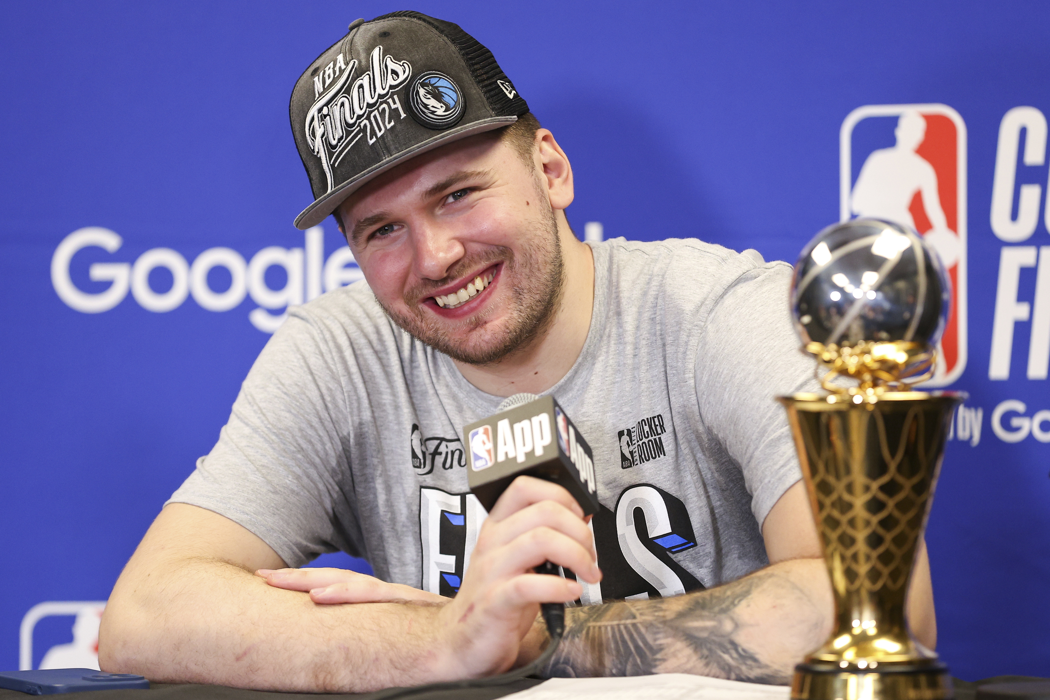 Dallas Mavericks guard Luka Doncic smiles during a news conference after the team's win over the Minnesota Timberwolves in Game 5 of the NBA basketball Western Conference finals Thursday, May 30, 2024, in Minneapolis. 